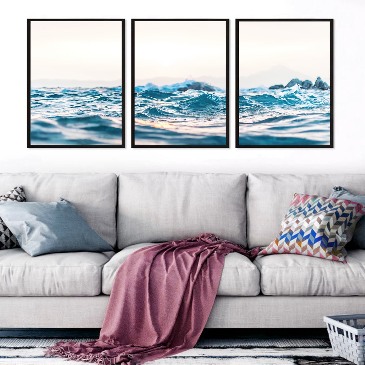 Sea waves wall art above the gray sofa.