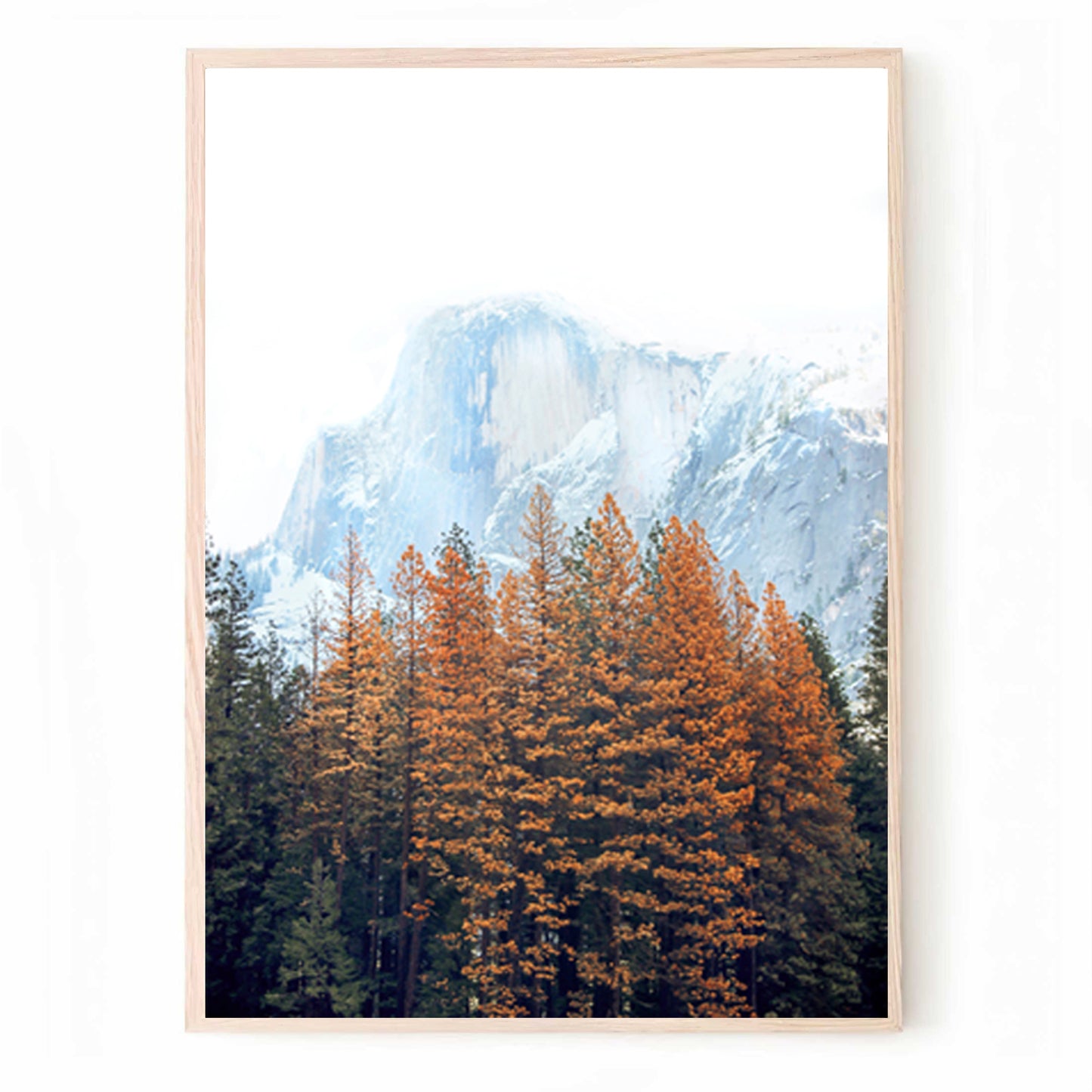 Print with autumn trees against a snowy peak.