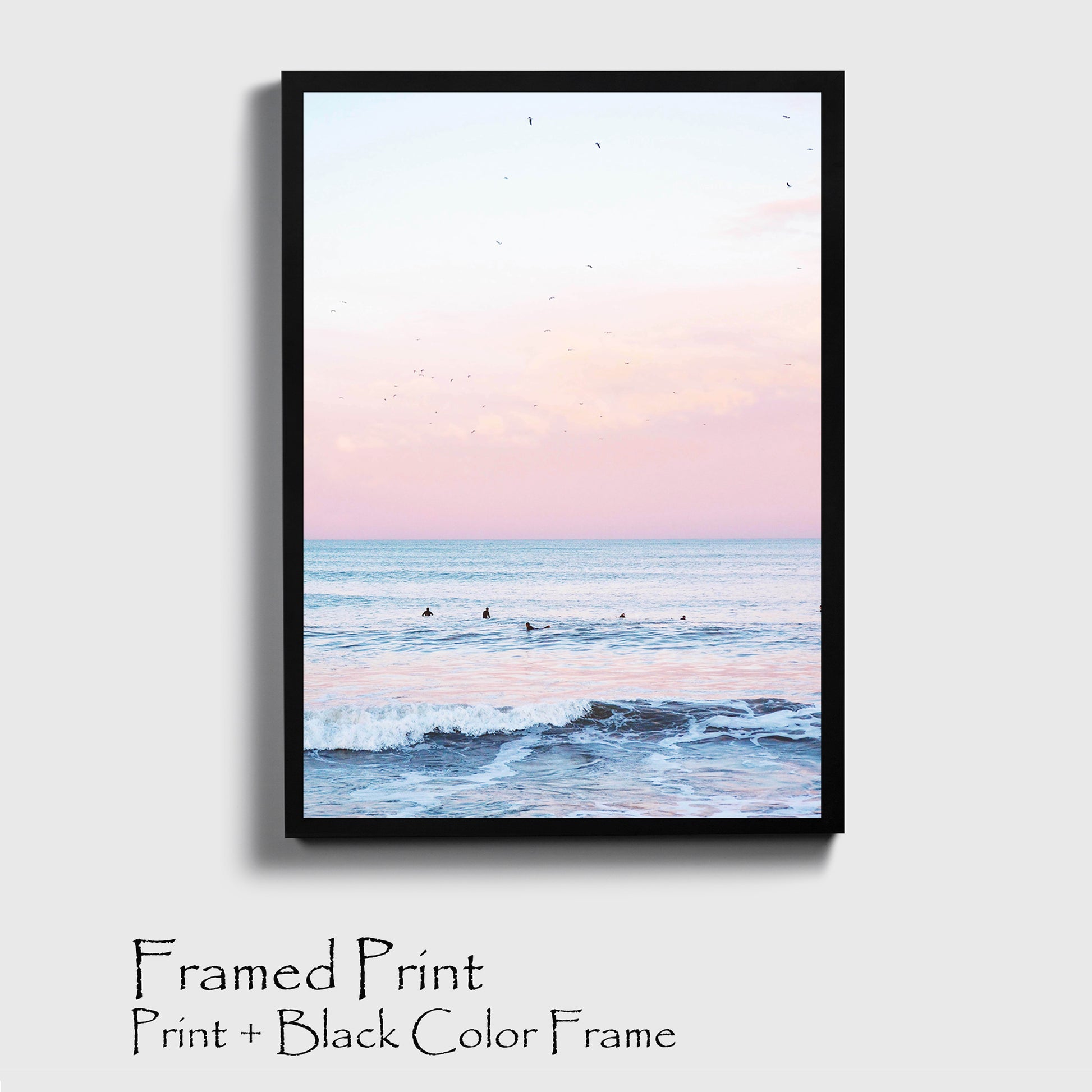 Ocean with surfer print in black color frame.