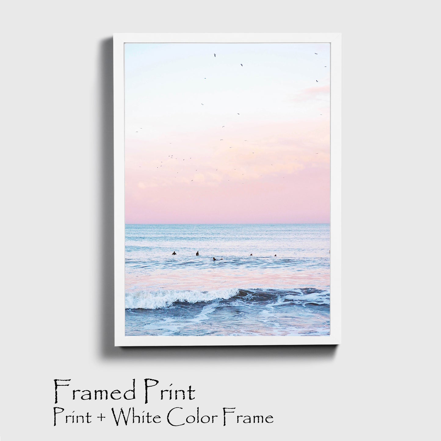 Ocean with surfer print in white color frame.