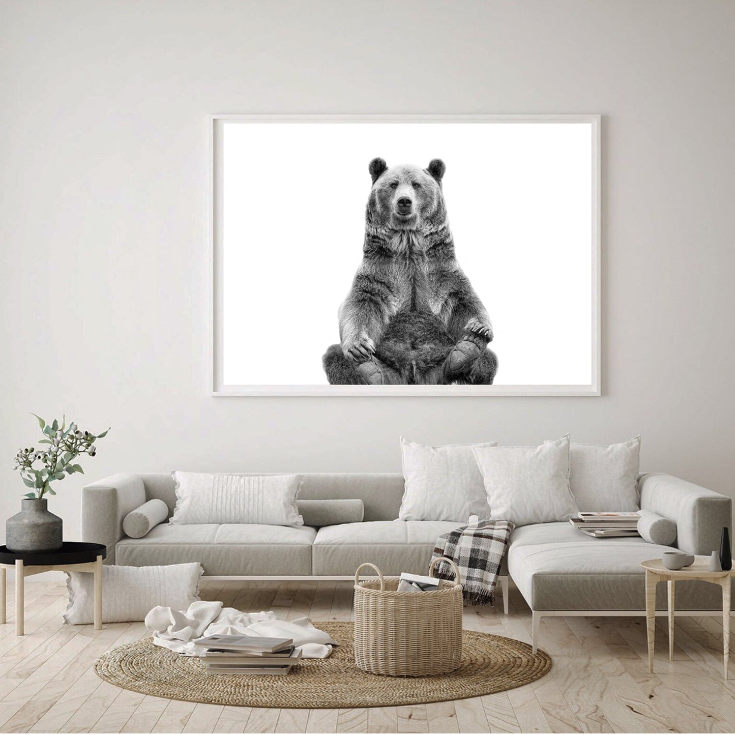 Sitting bear black white wall art in living room.