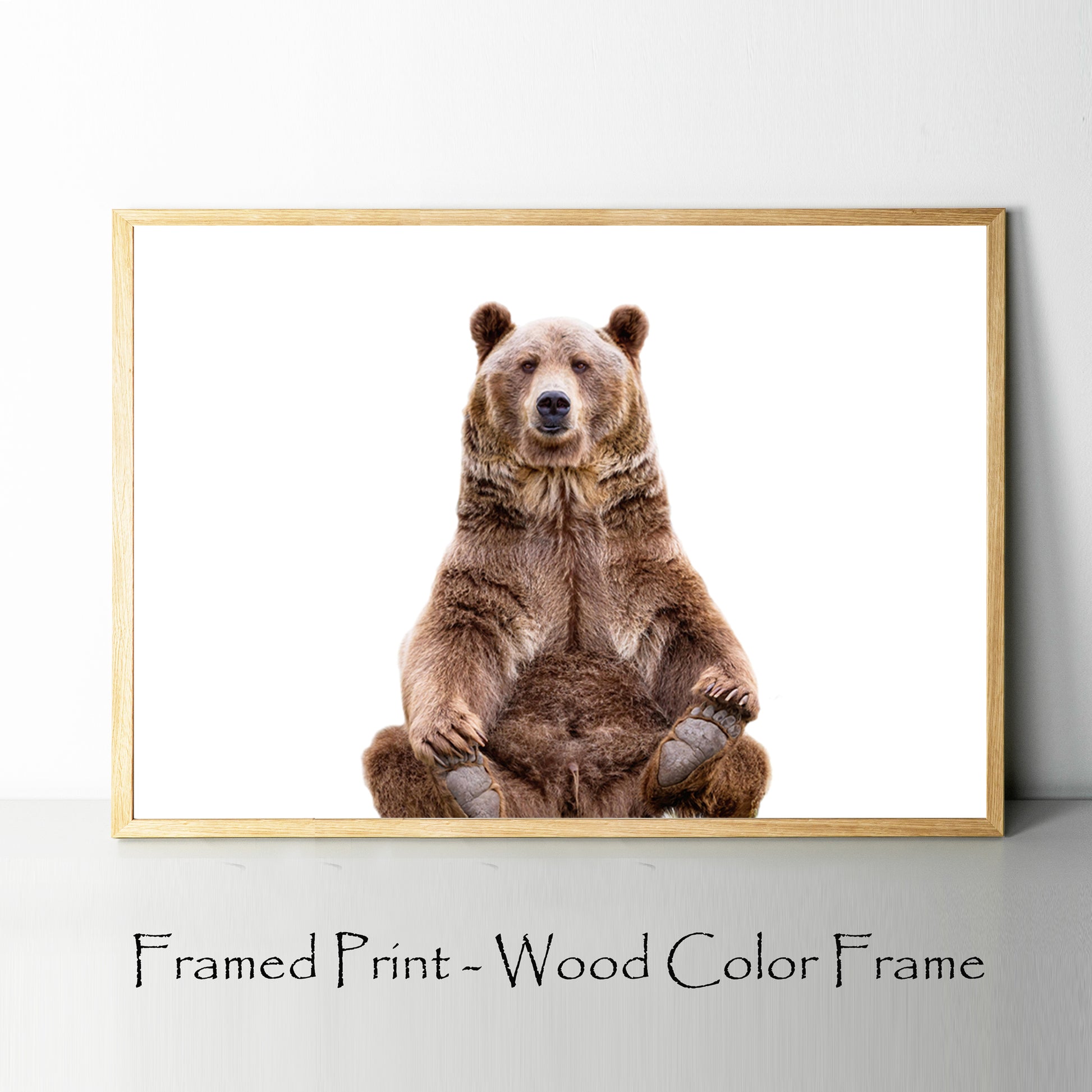 Sitting bear print in wood color frame.