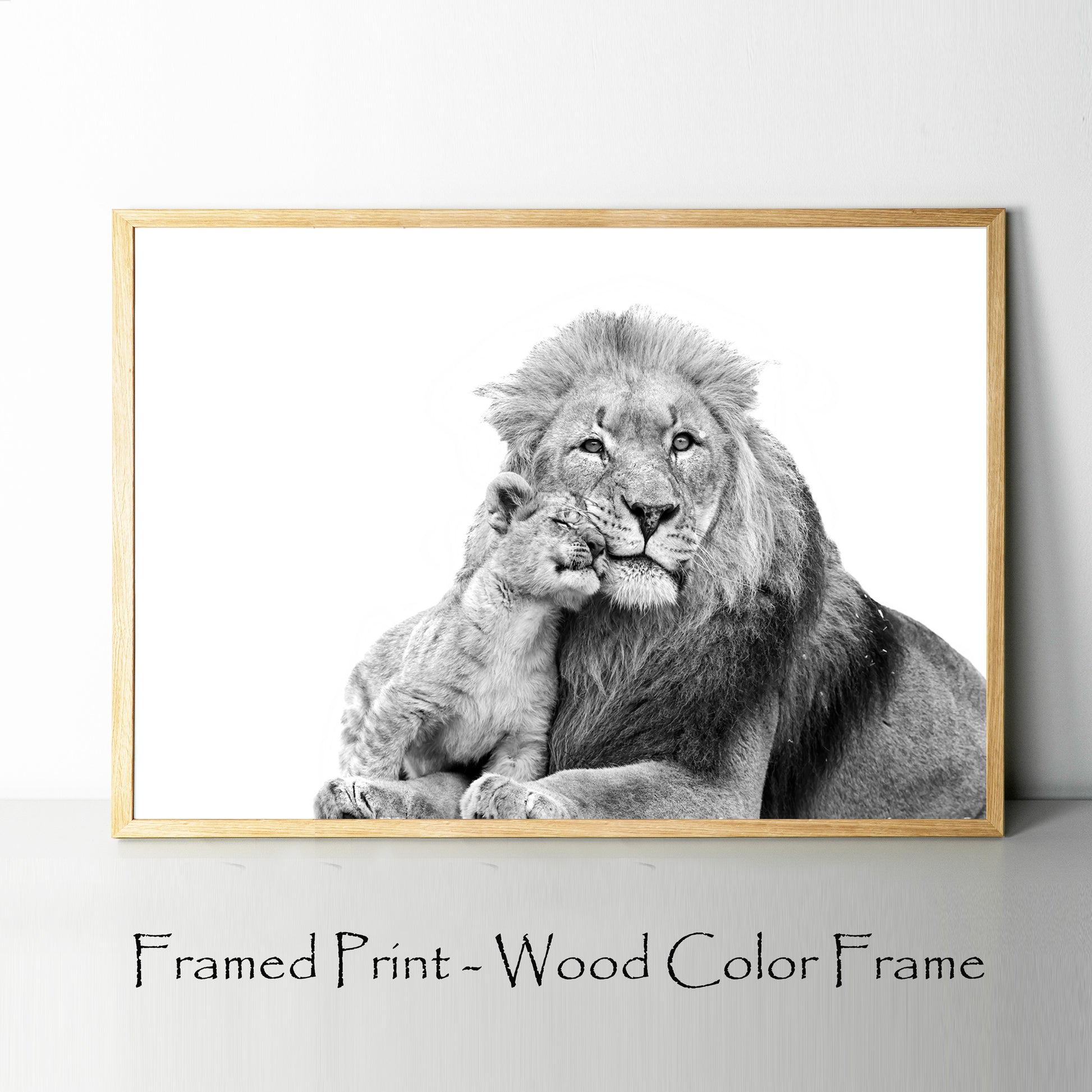 Lion and cub print in wood color frame.