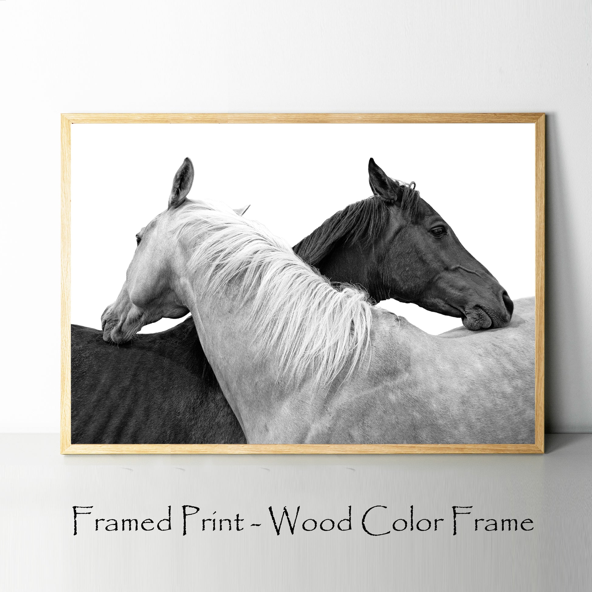 Two horse wall art with wood color frame.