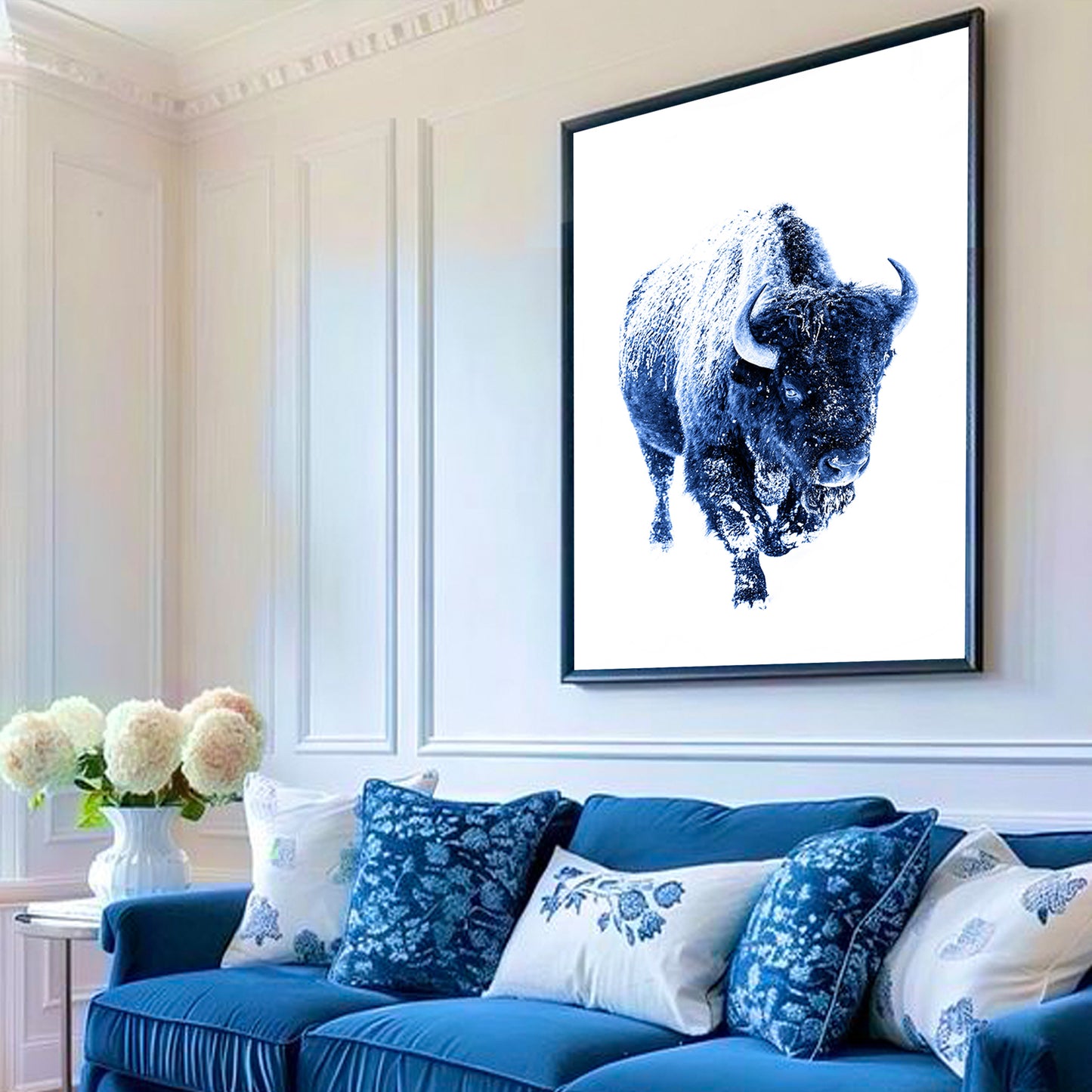 Navy blue bison print above the blue sofa.