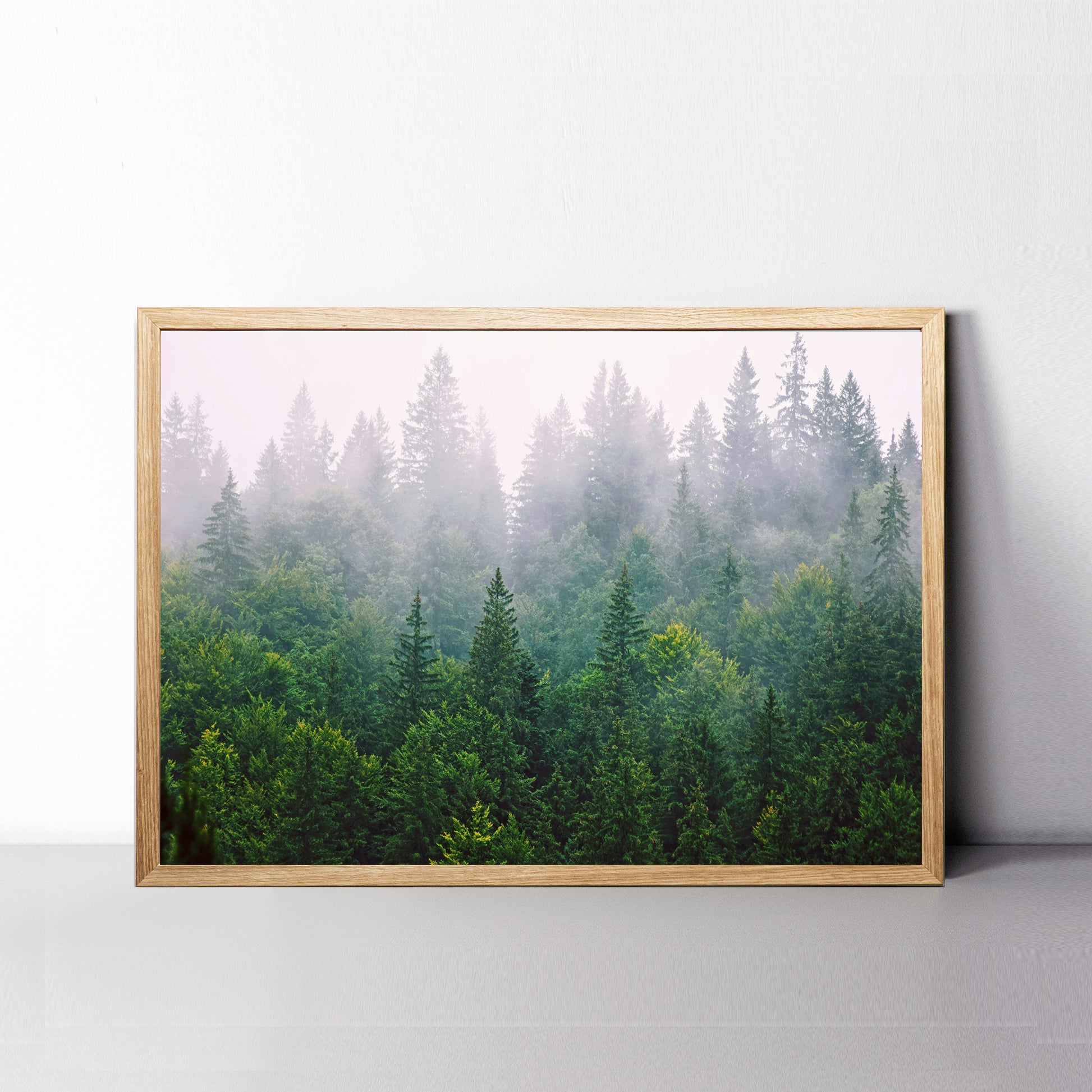 Misty forest print in wood color frame.