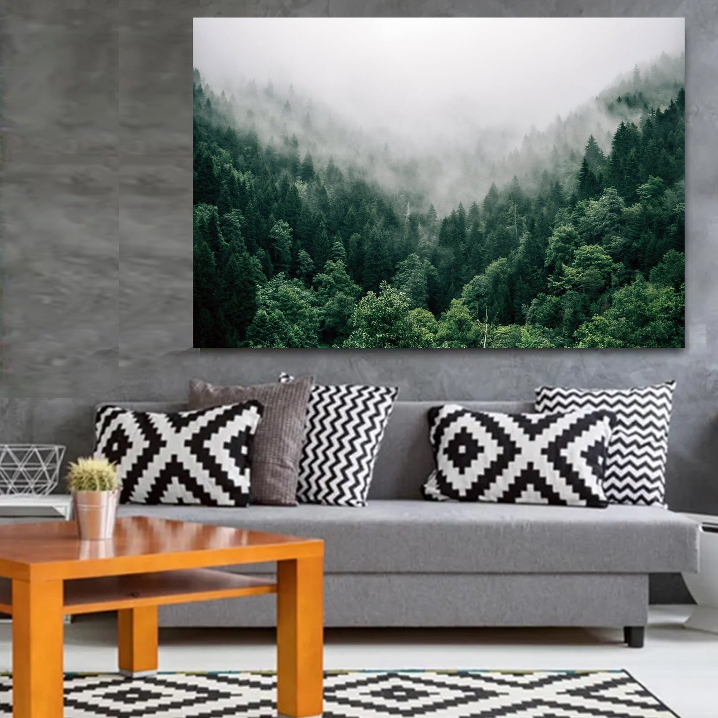 Stretched canvas with forest photo on dark wall.
