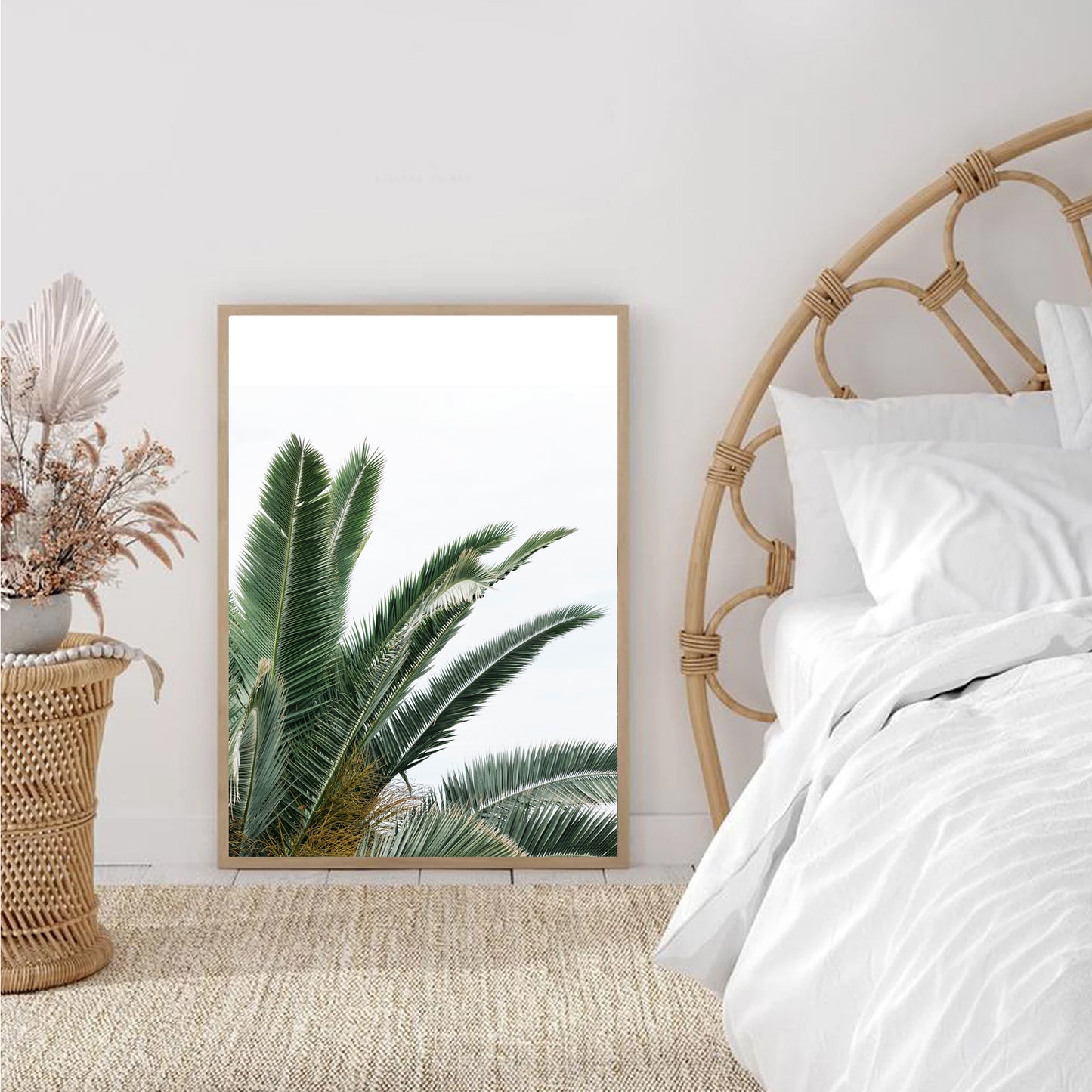 Palm leaves poster in bedroom.