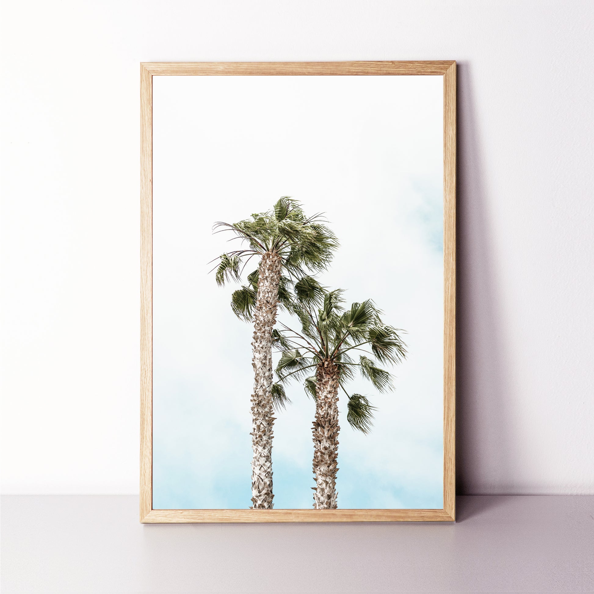 Two pam trees photo in wod color frame