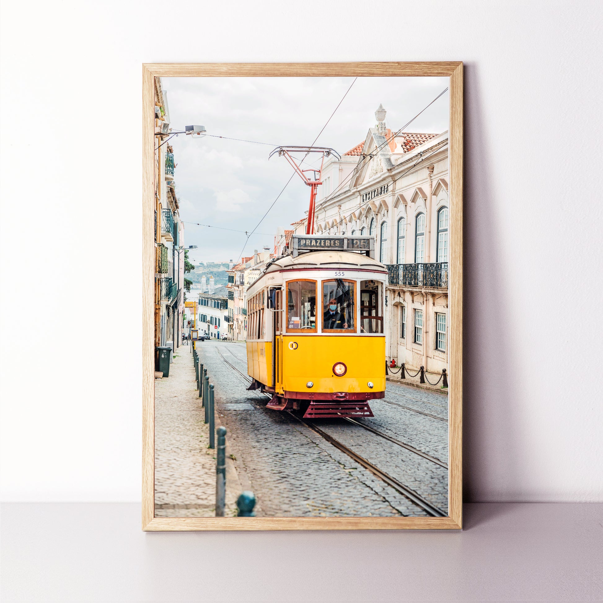Framed poster with yellow tram of Lisbon.