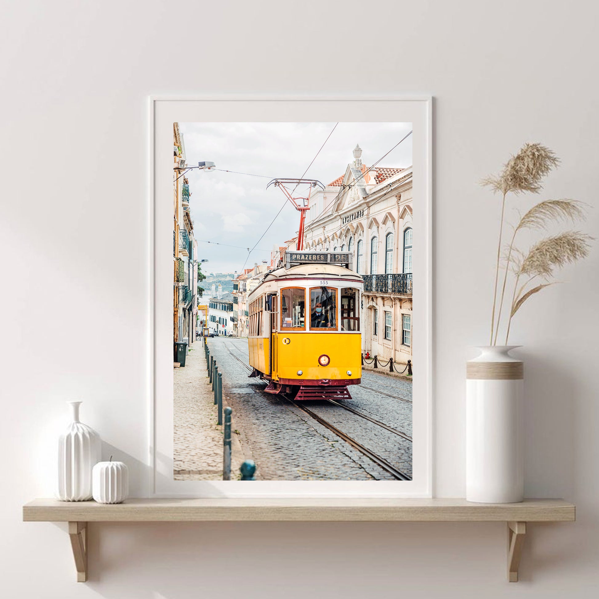 Yellow tram on the street of Lisbon.