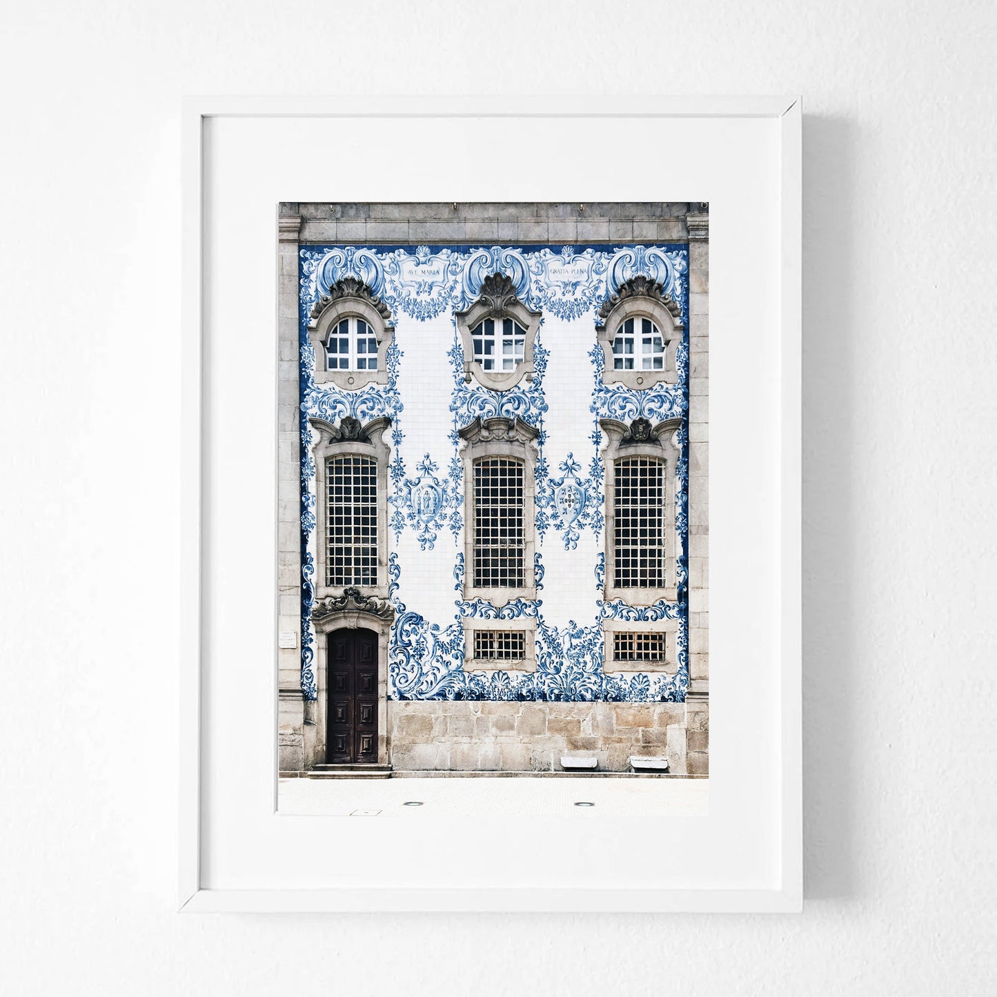 Blue house print in white color frame.