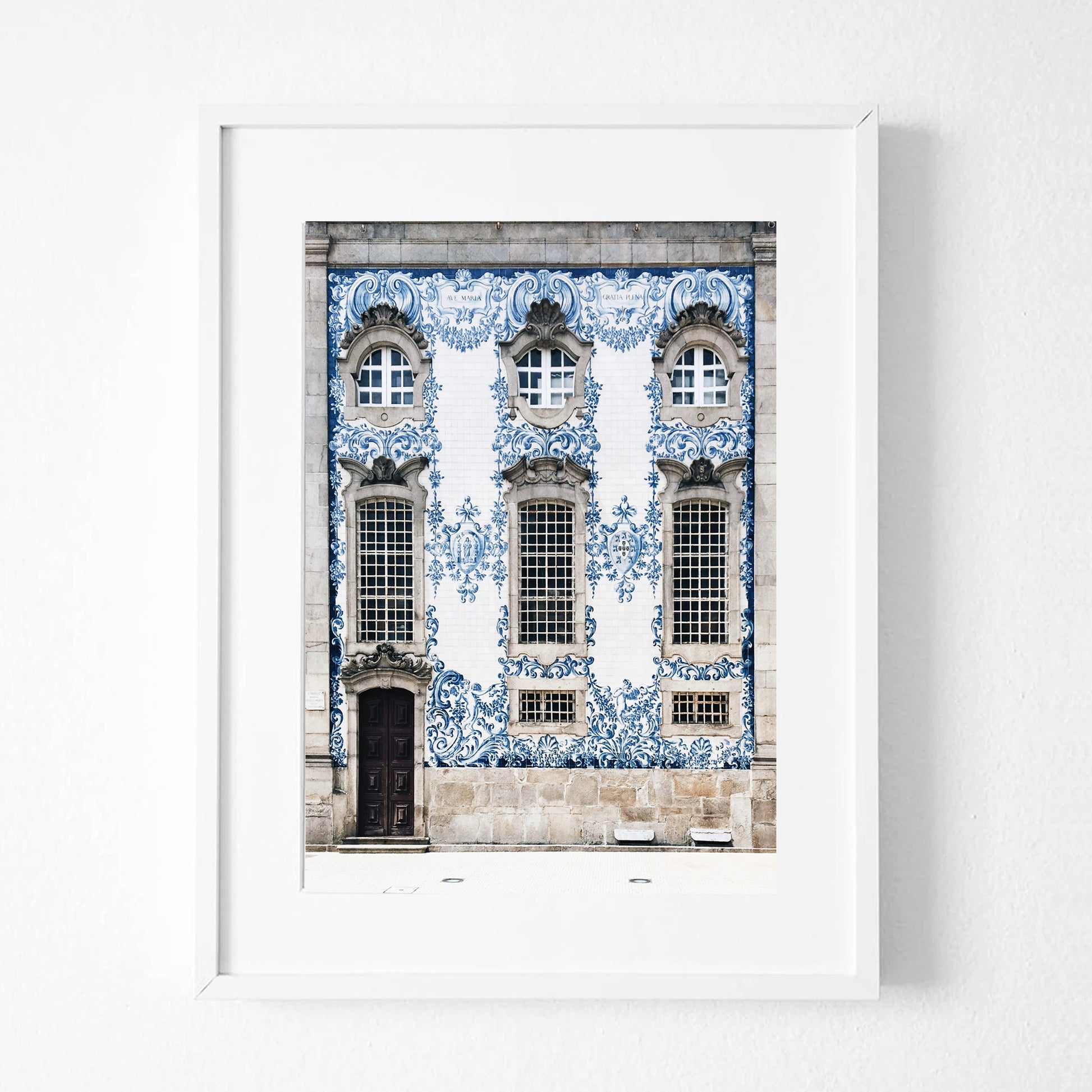 Blue house print in white color frame.