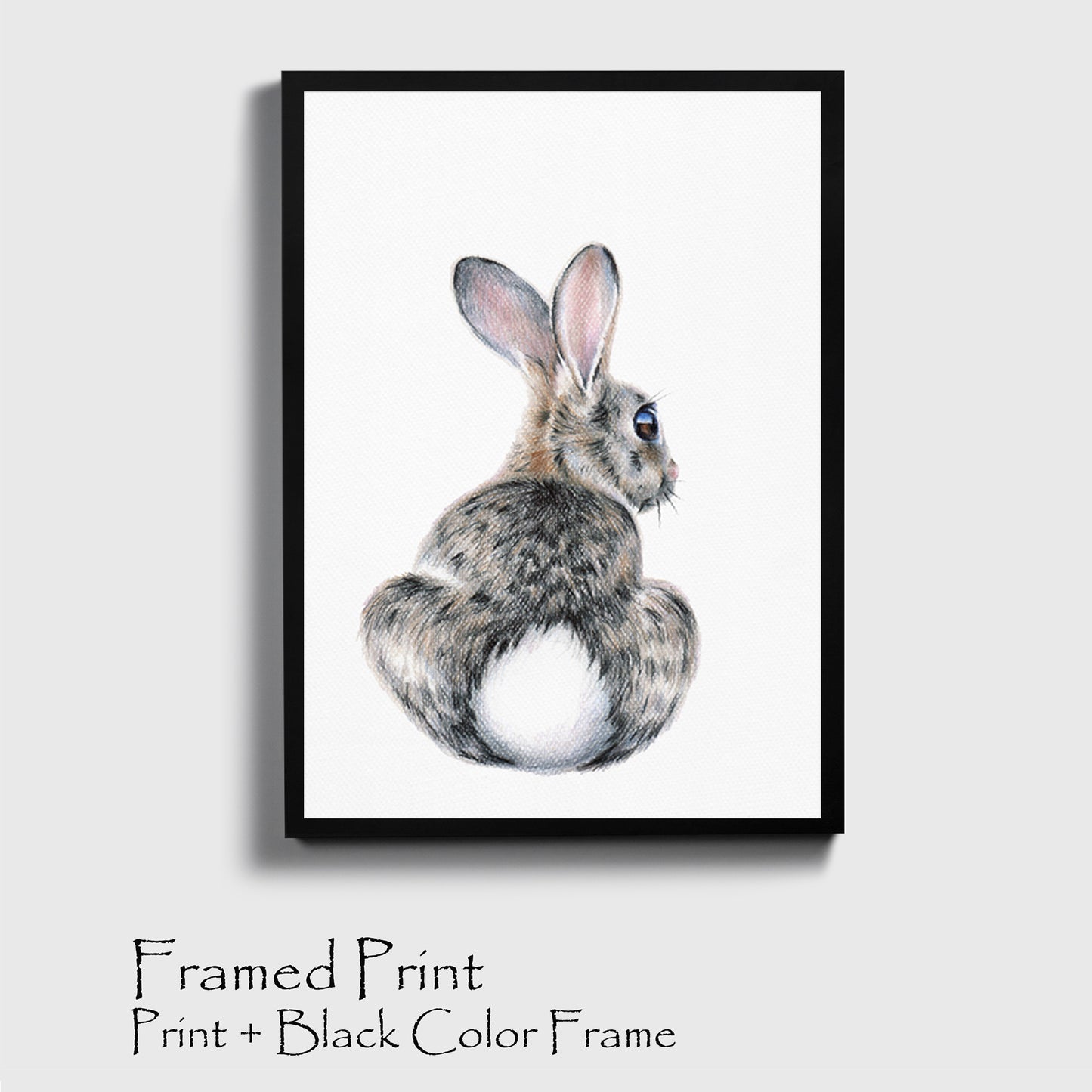 Bunny drawing print in black color frame.