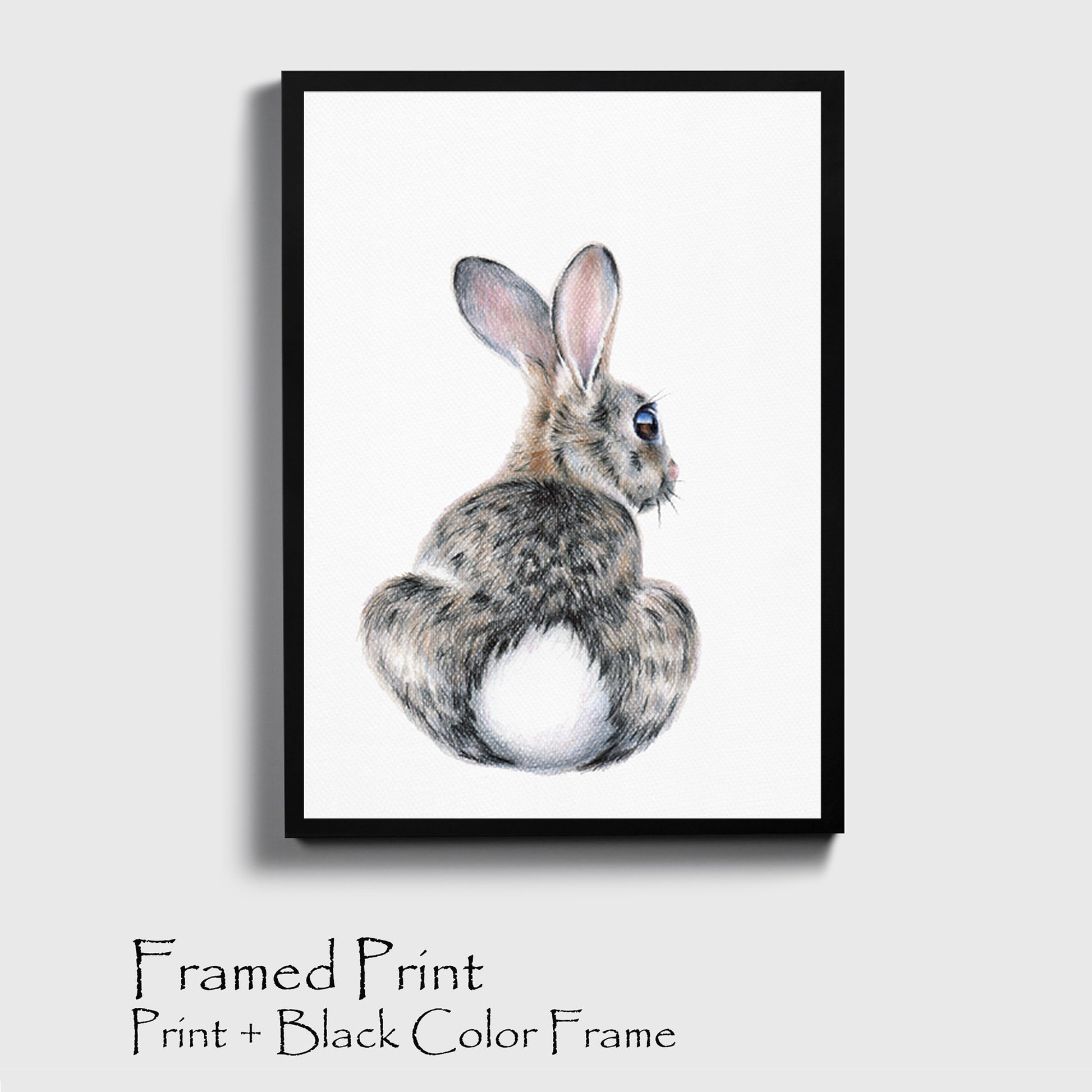 Bunny drawing print in black color frame.