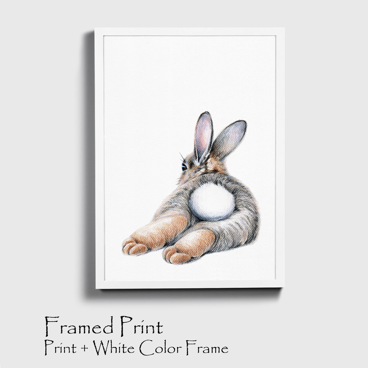 Bunny picture print in white color frame.