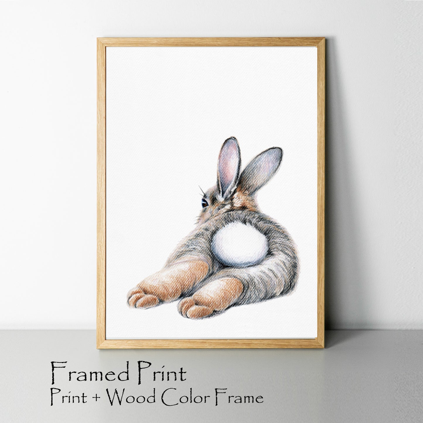 Bunny picture print in wood color frame.