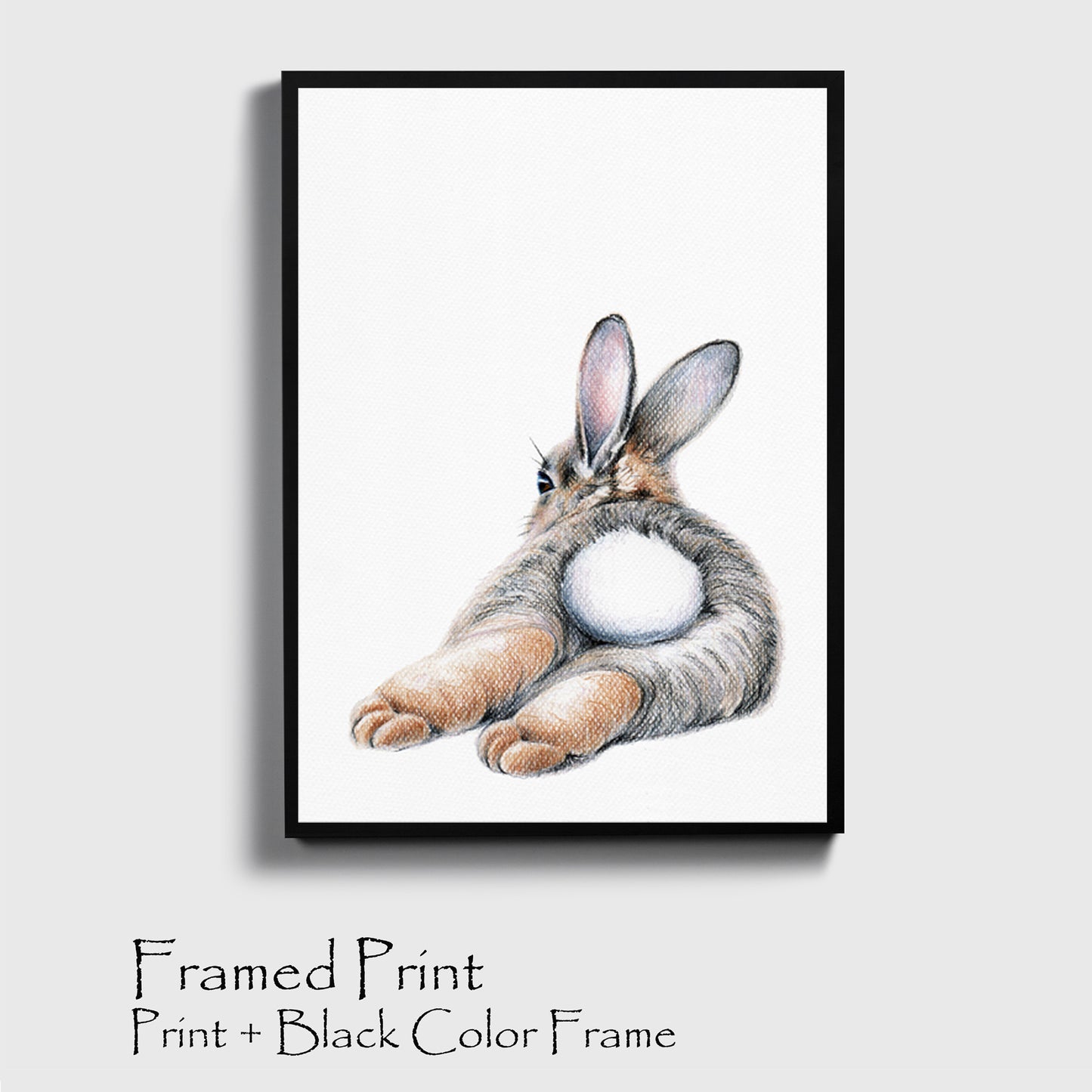 Bunny picture print in black color frame.