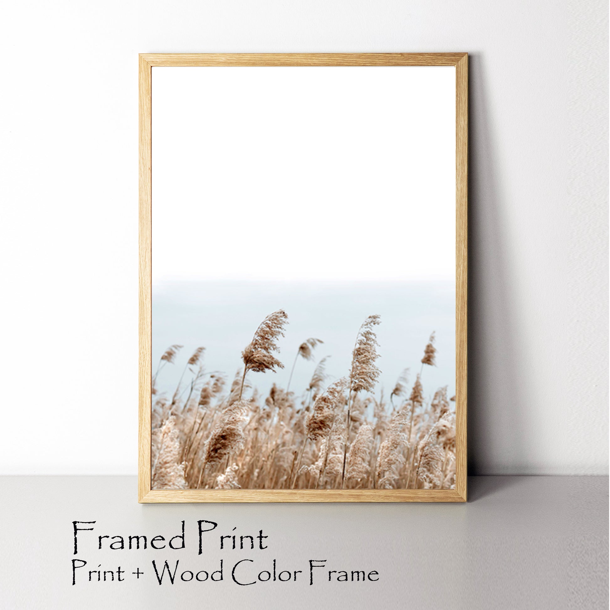 Pampa grass print in wood color frame.