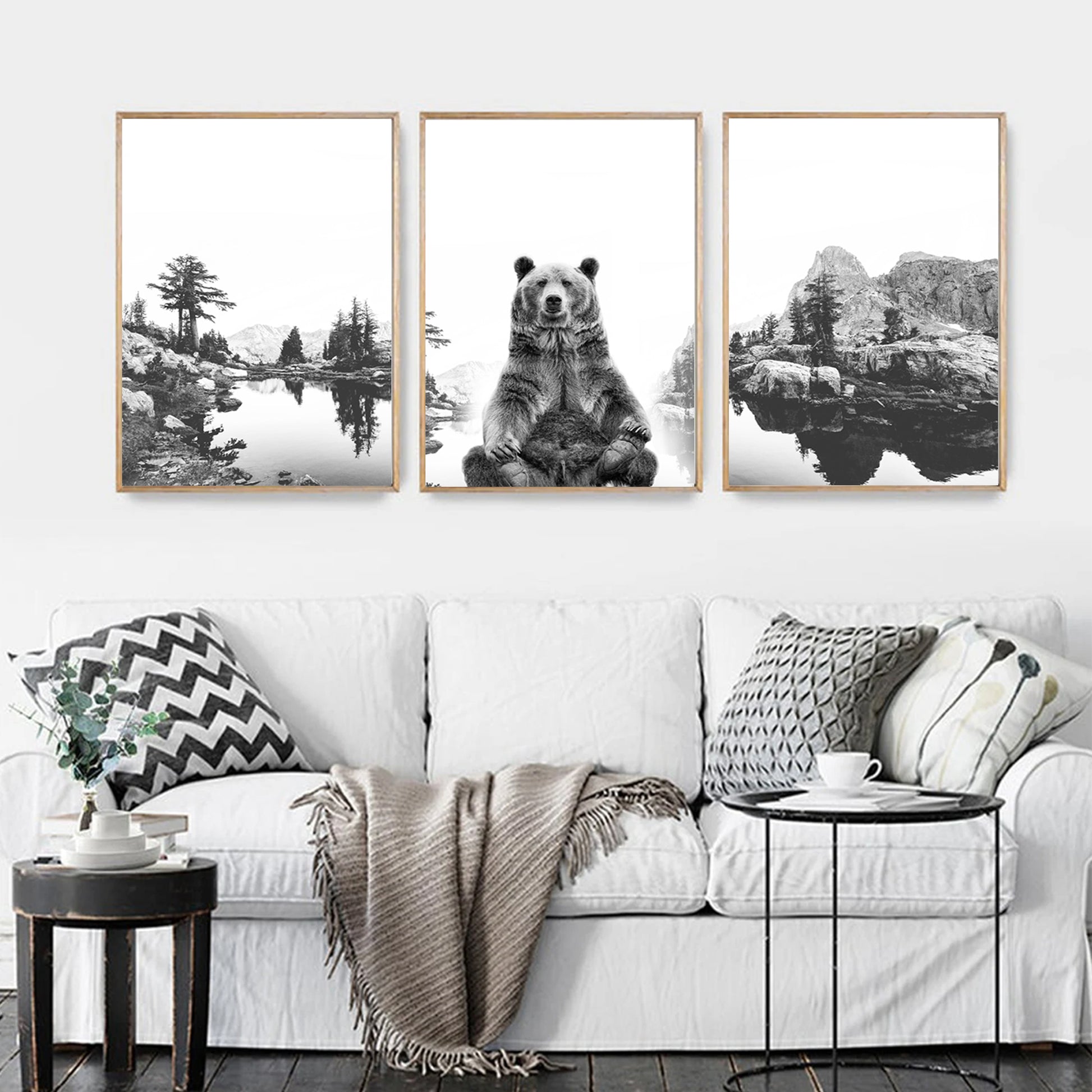 3 piece wall art with bear and lake above the sofa.