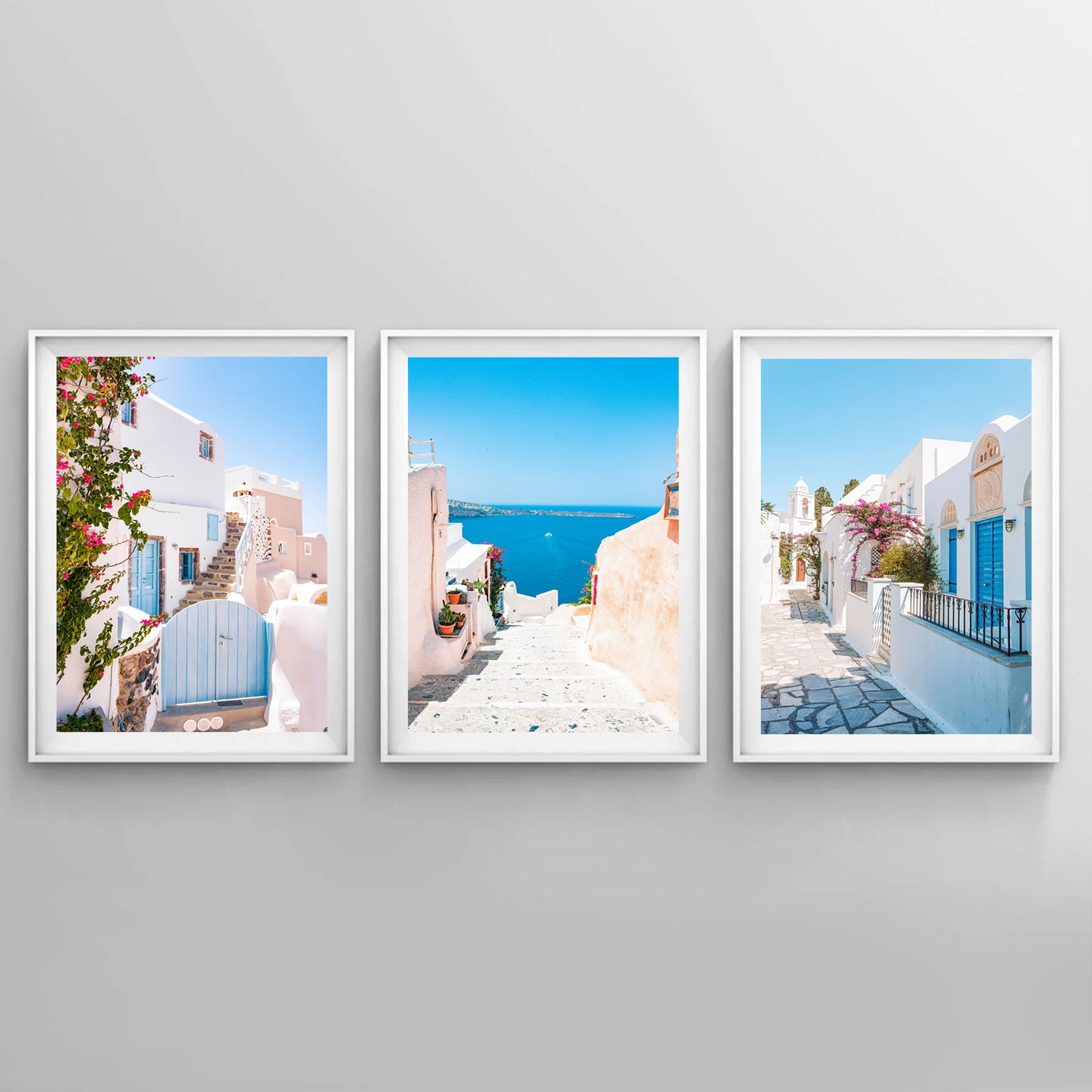 Pink and blue seaside landscapes wall art set.