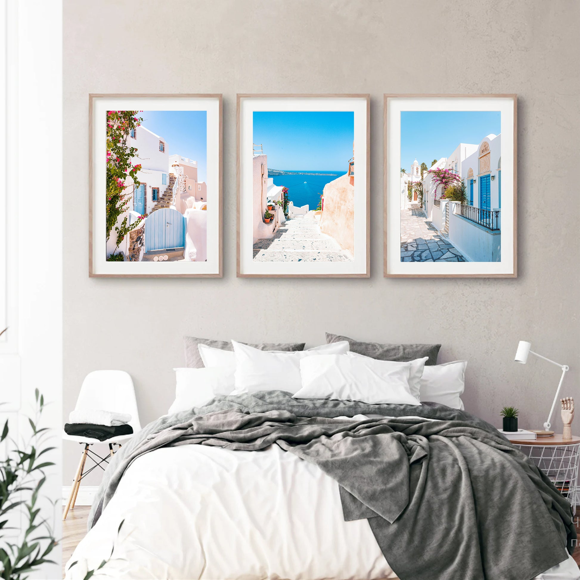 Greek island photos in bedroom.