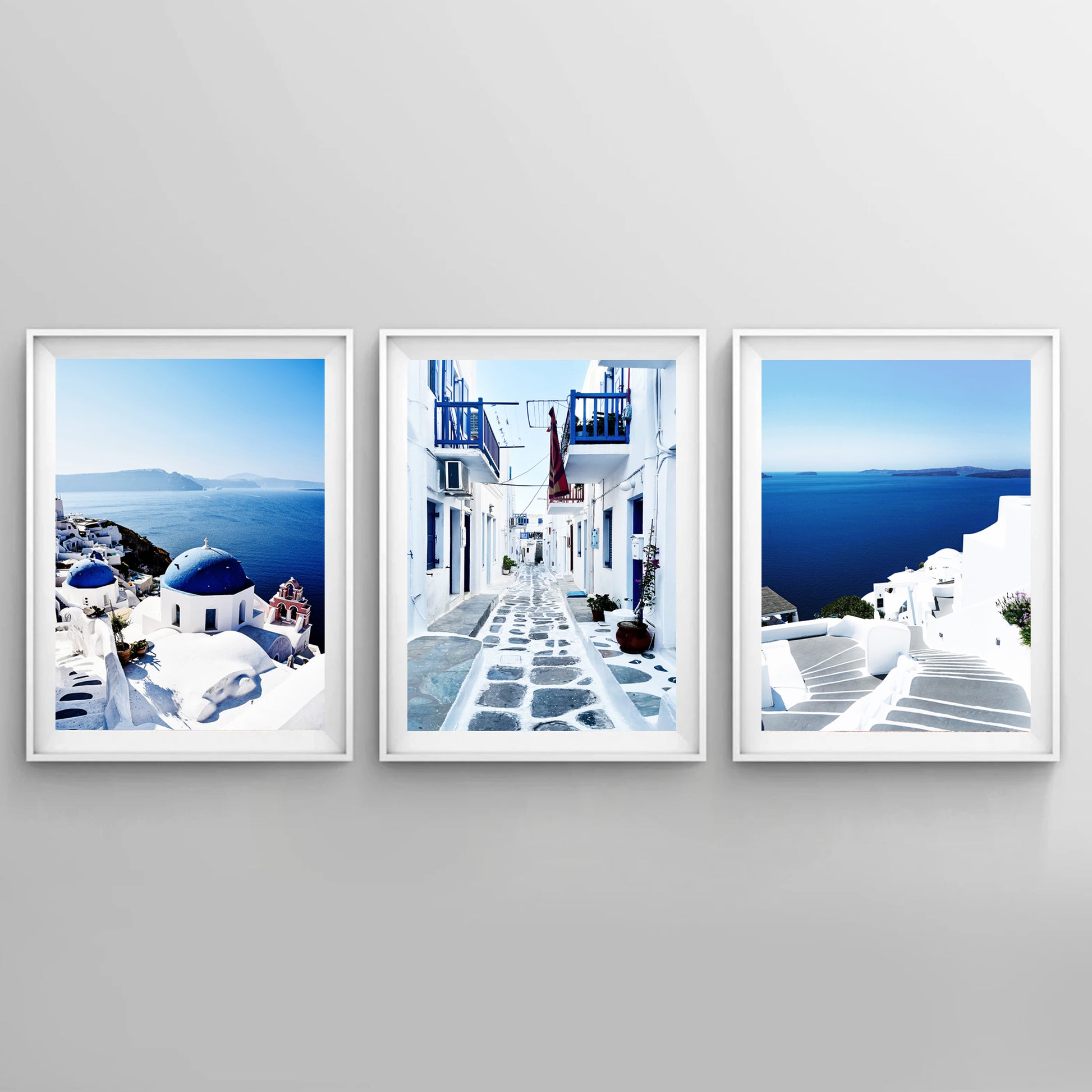 Navy blue sea and white houses of Greek islands.