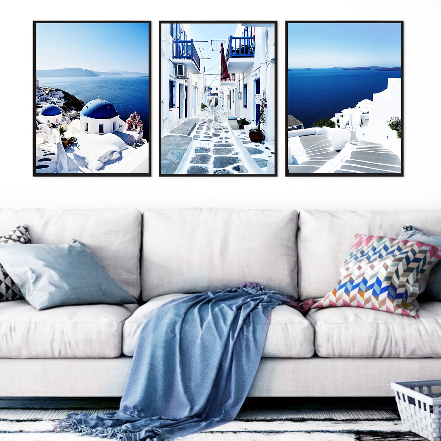 Navy blue wall art set with Greek islands seaside landscapes.