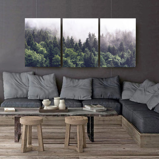 Misty forest canvas wall art against a dark gray-black wall.