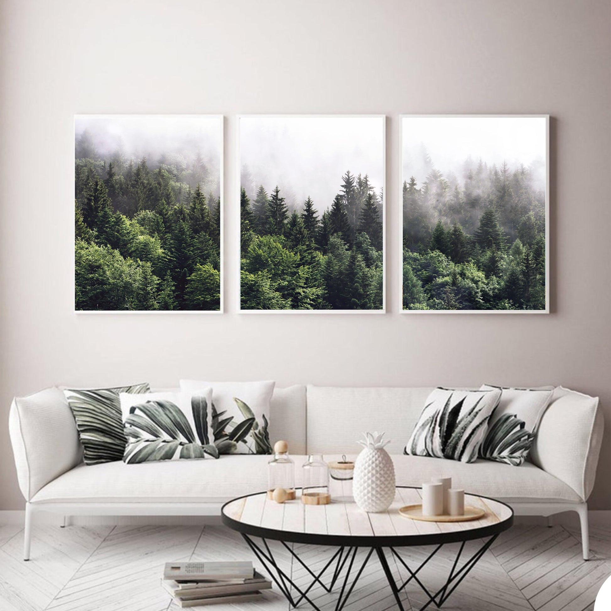 Green forest wall art set above the sofa.