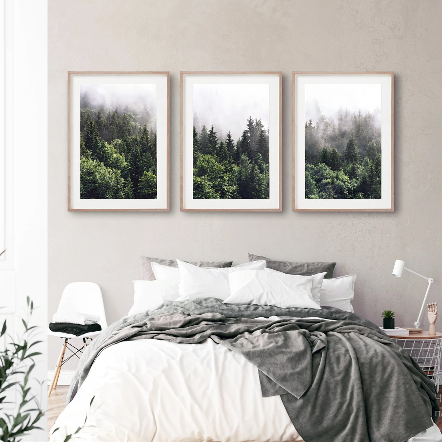 Nordic nature landscape triptych in bedroom.