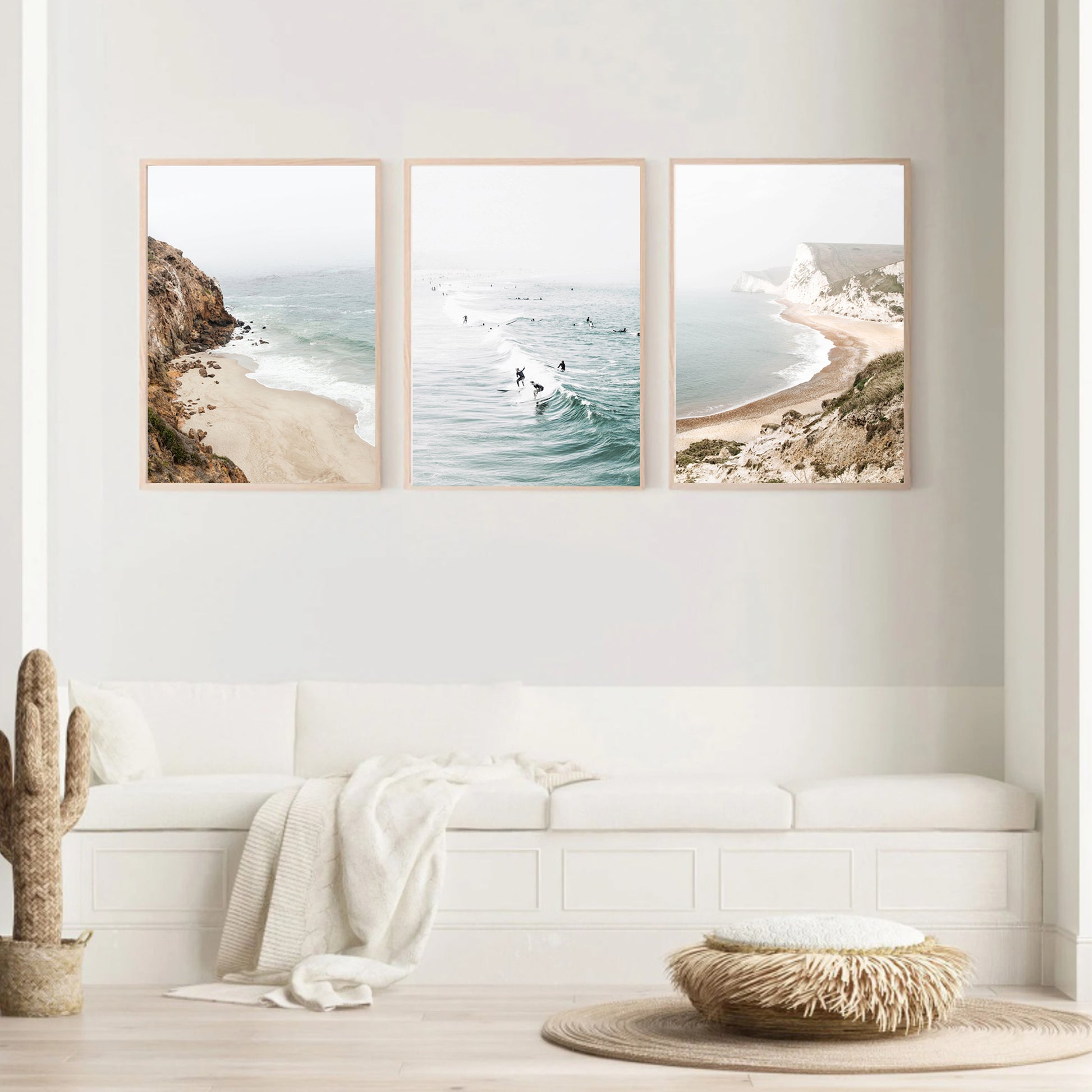 Coastal 3 piece wall art with wood color frames in the interior in light neutral tones.