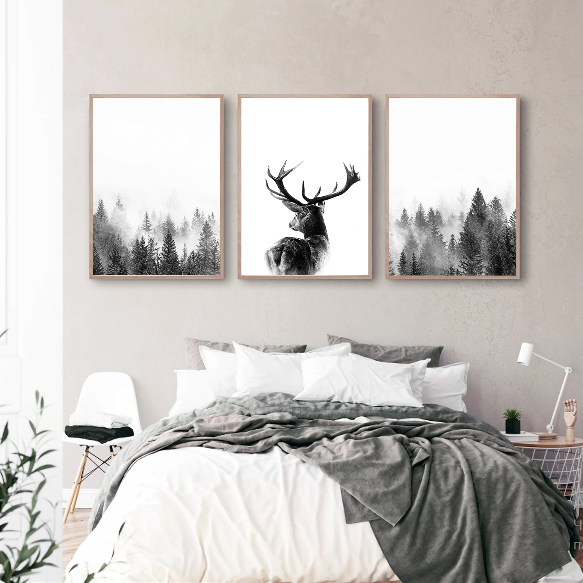 Deer and forest triptych decorates the bedroom.