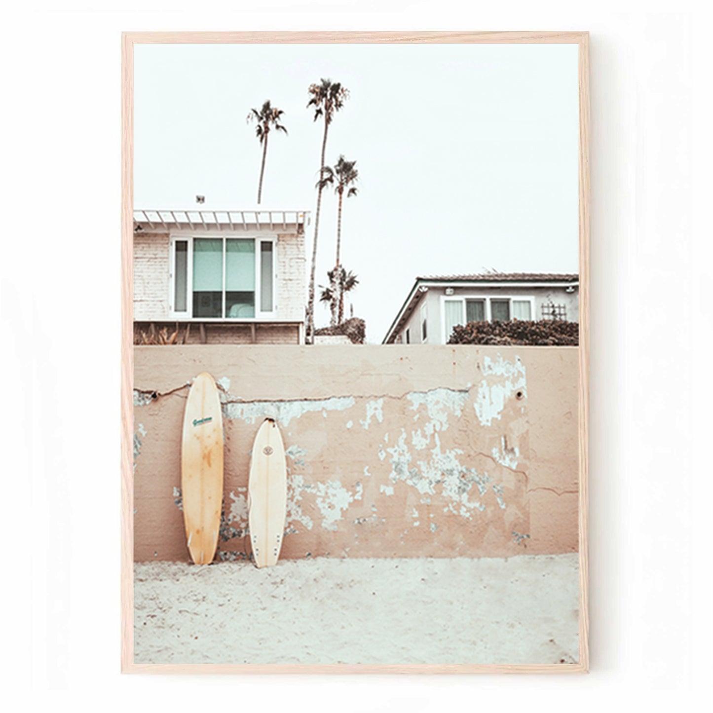 Poster with surfboards on a sandy beach.