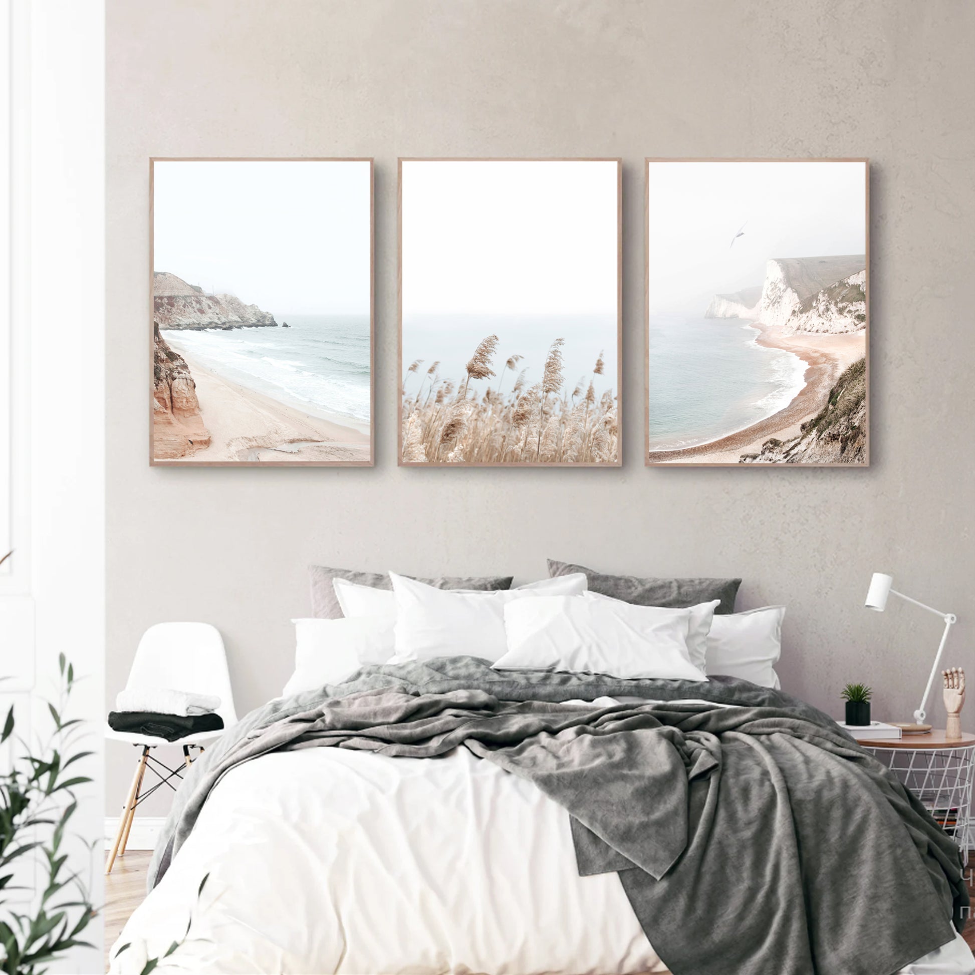 Coastal prints in bedroom.