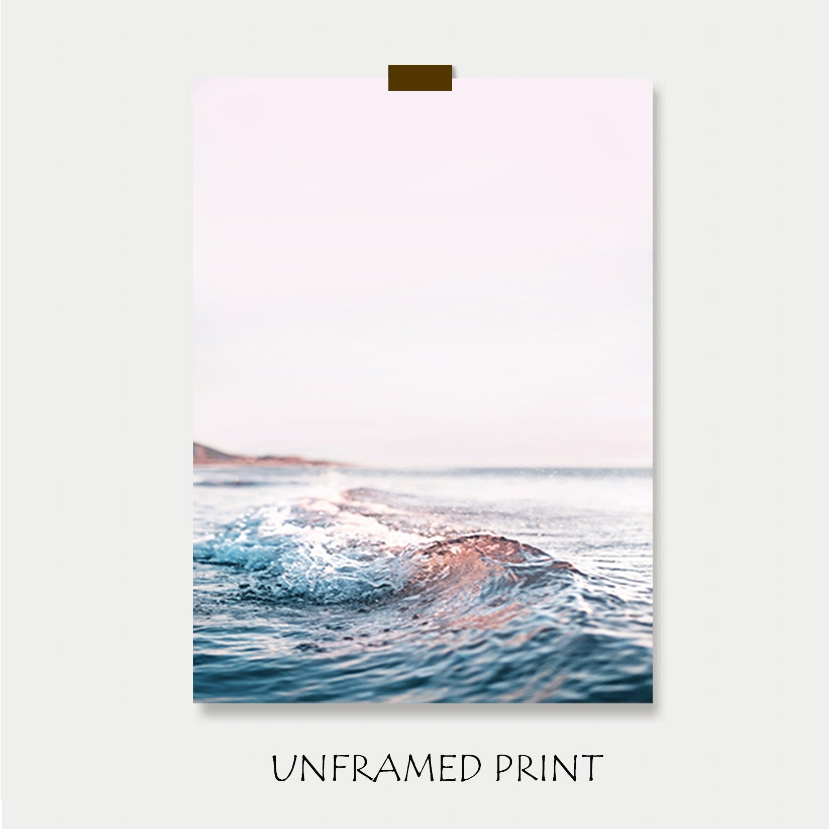 Unframed print with ocean wave.