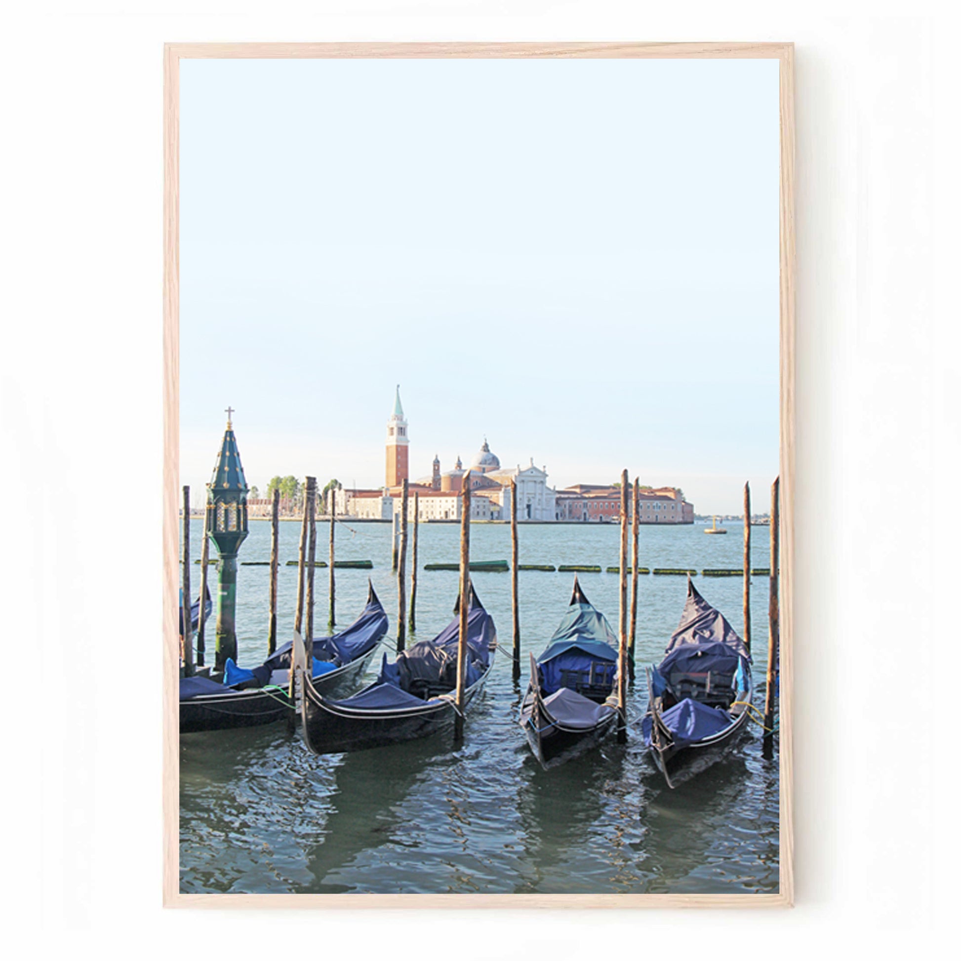 Gondolas along the embankment, Venice, Italy.