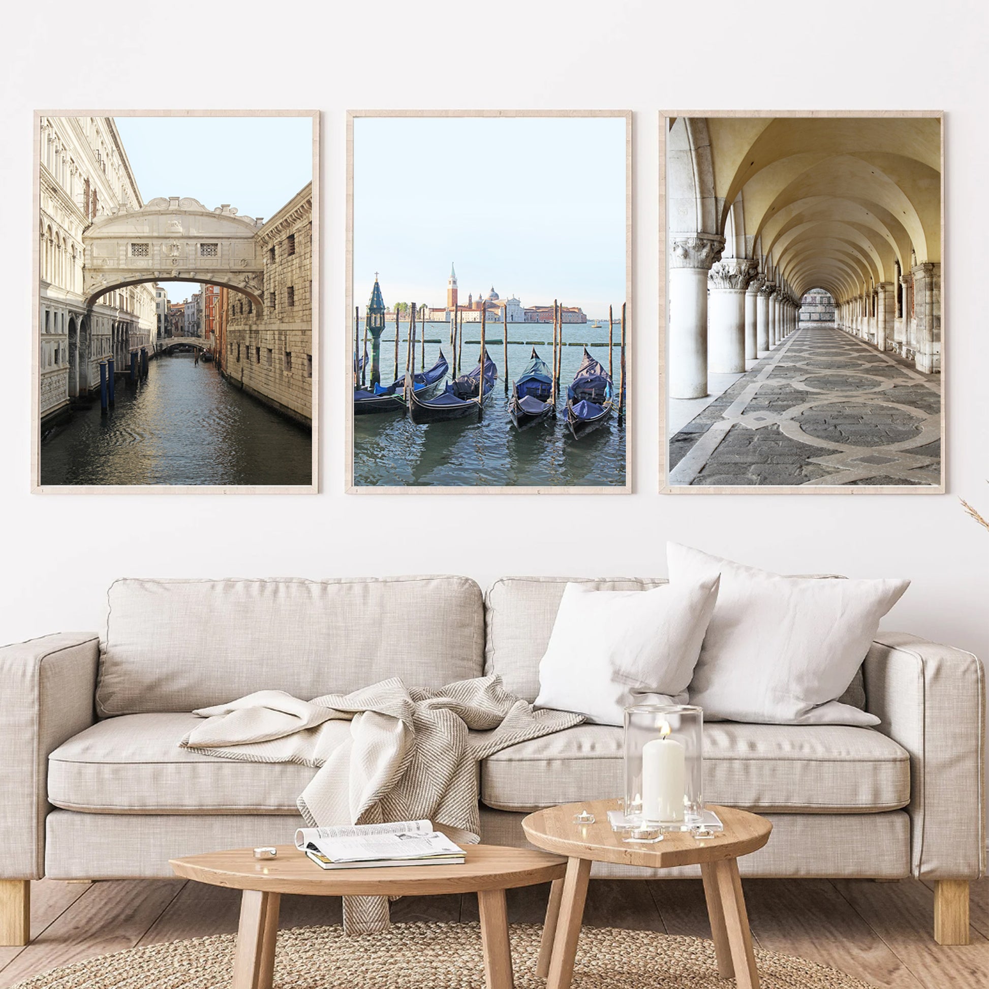 Venice triptych in wood color frames hangs above the sofa.