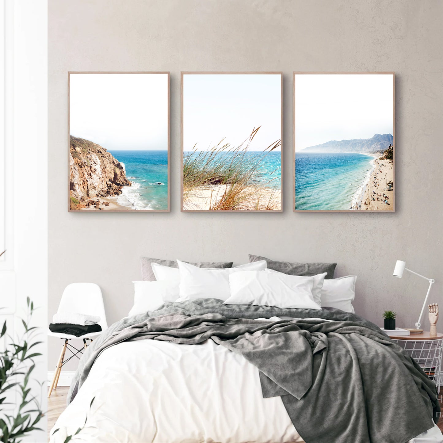 Vibrant beach posters in bedroom.