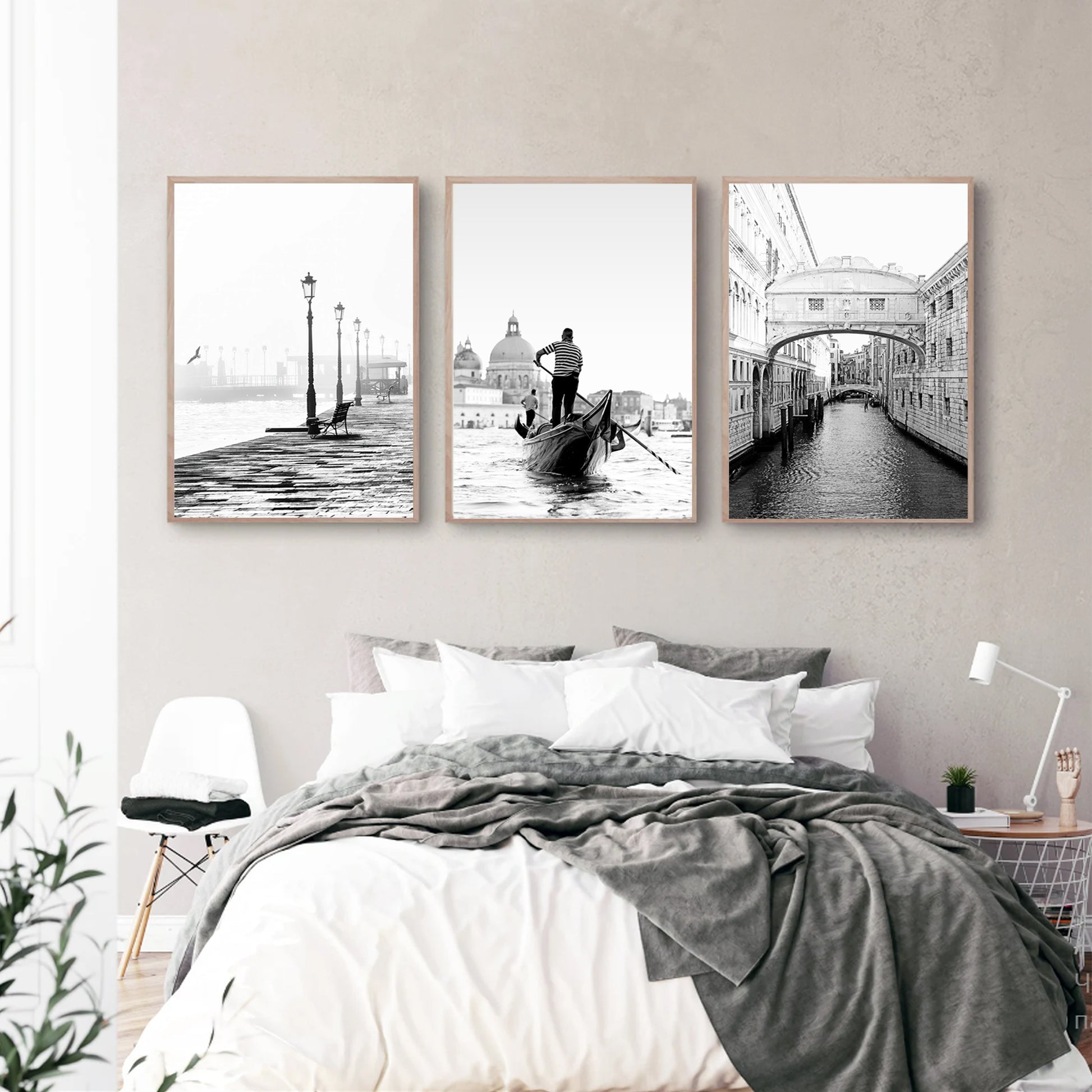 Venice black white photos in bedroom.