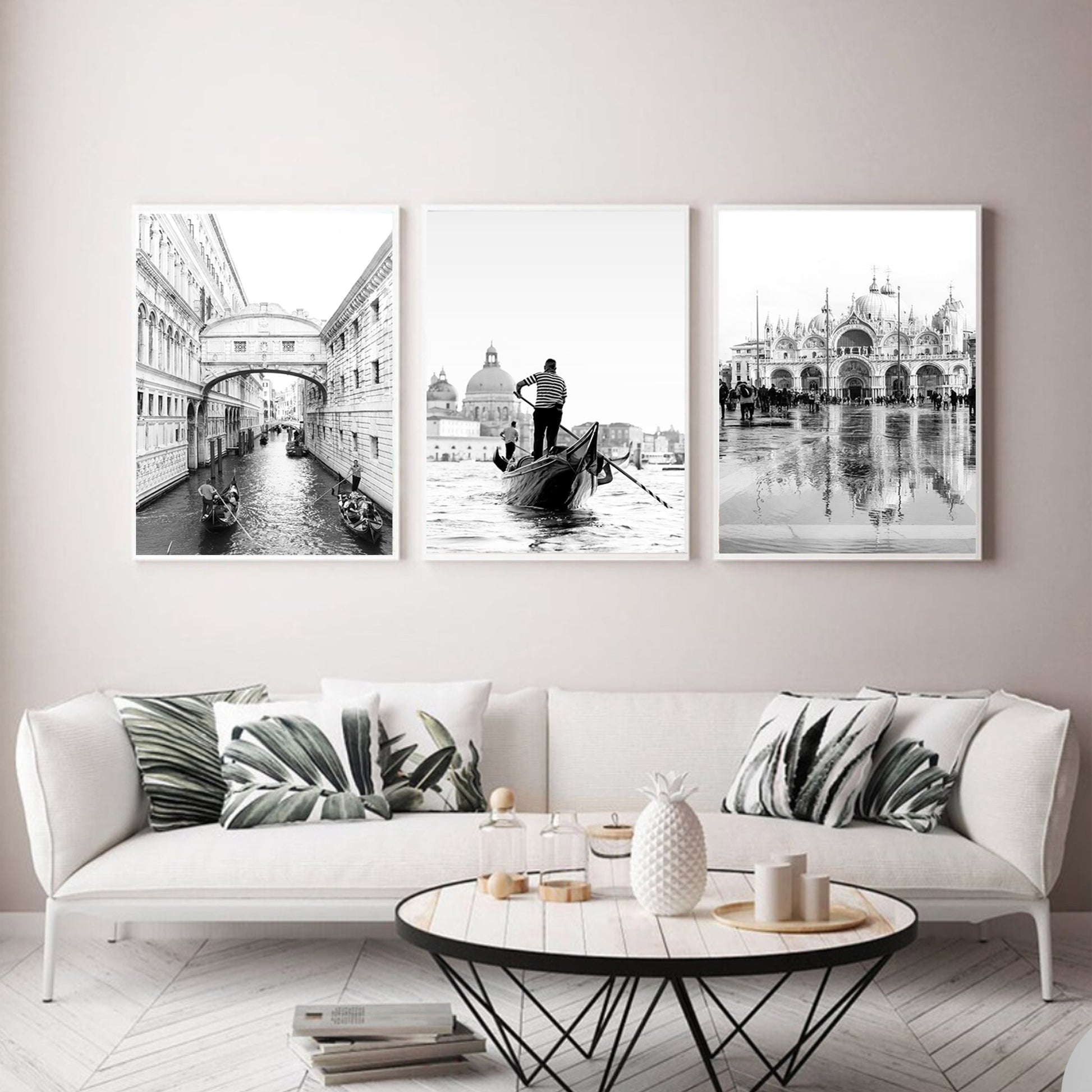 Triptych of Venie in white color frames.