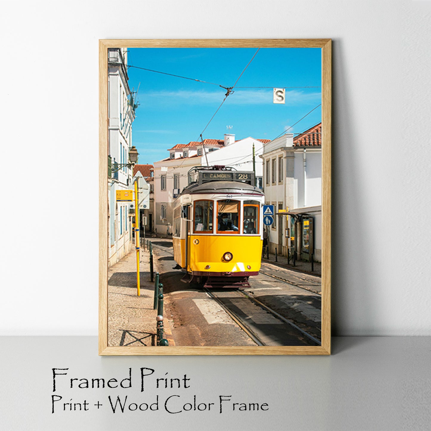 Lisbon yellow tram framed print.