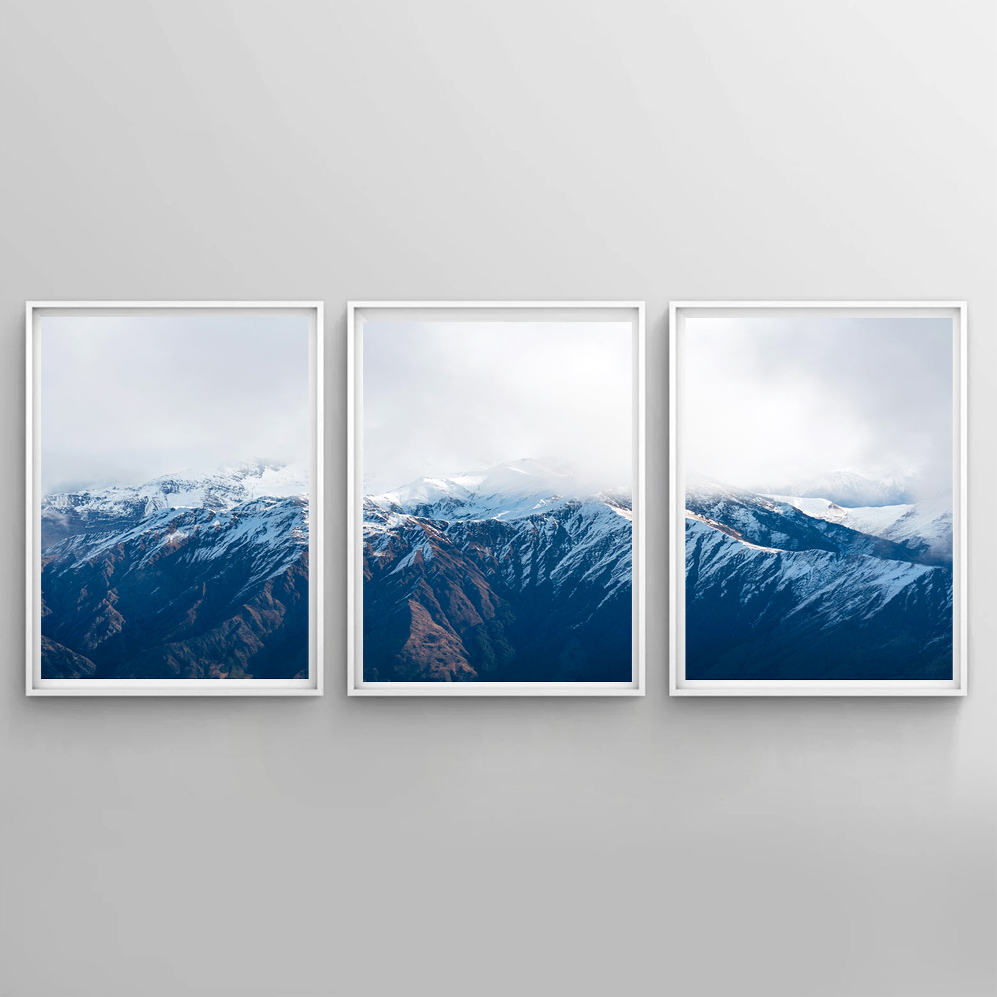 Mountains landscape wall art in white color frames.