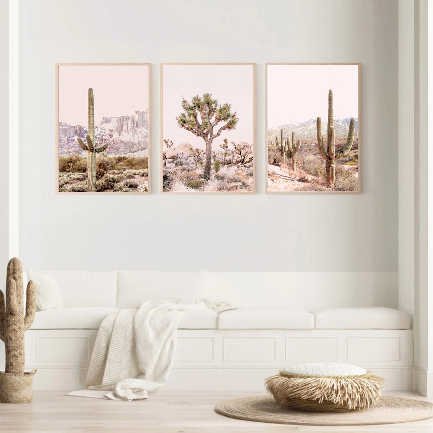 Pink and beige wall art set with cacti in neutral colors interior.