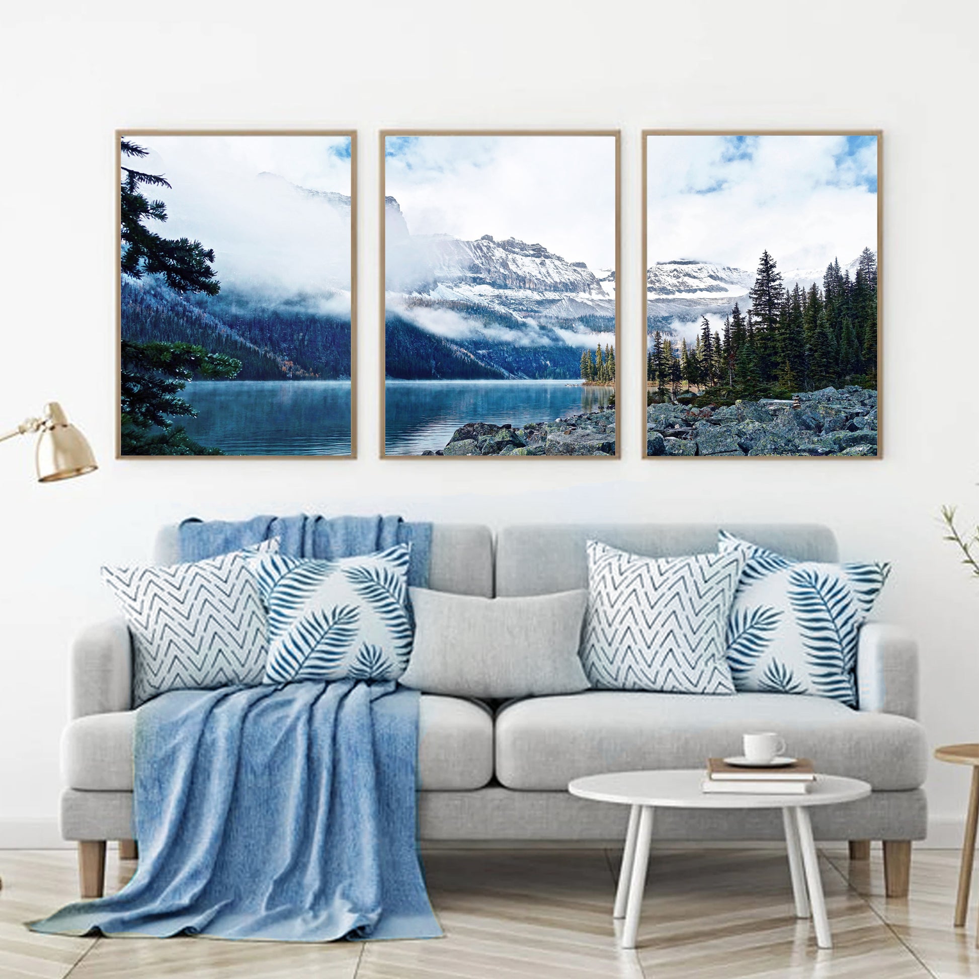 Mountain landscape triptych above the sofa.