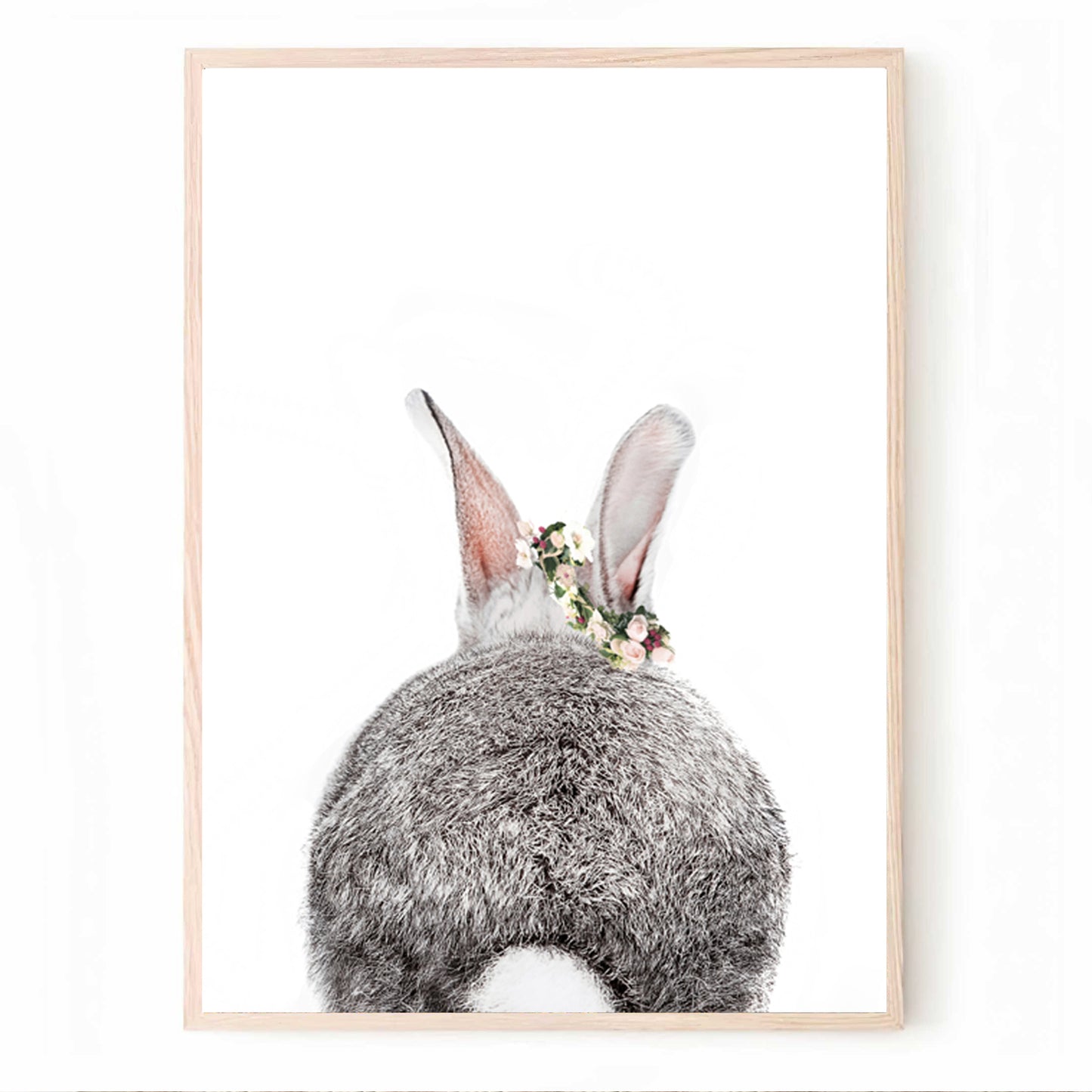 Bunny tail print in wood color frame.