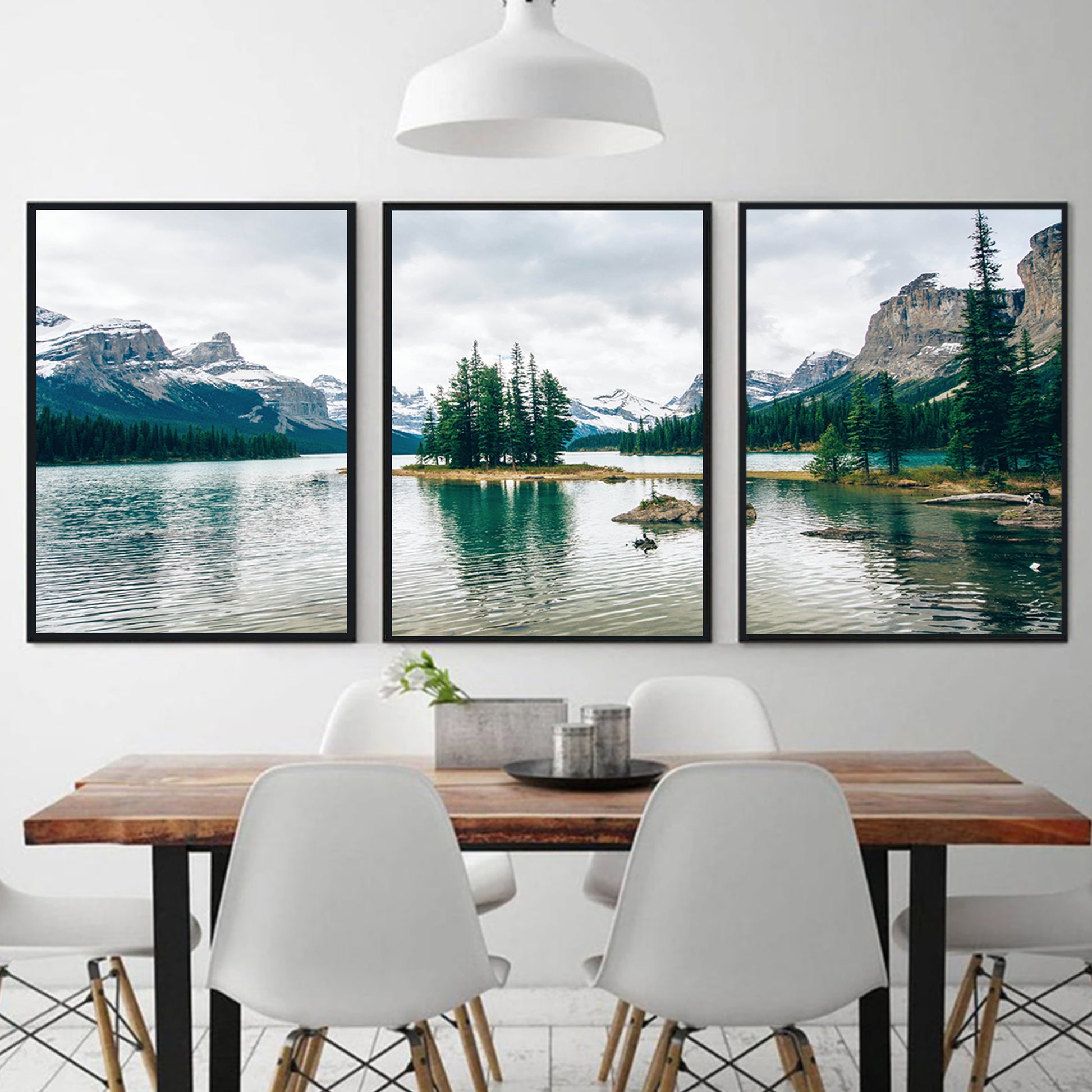 Mountain lake prints in black color frames.