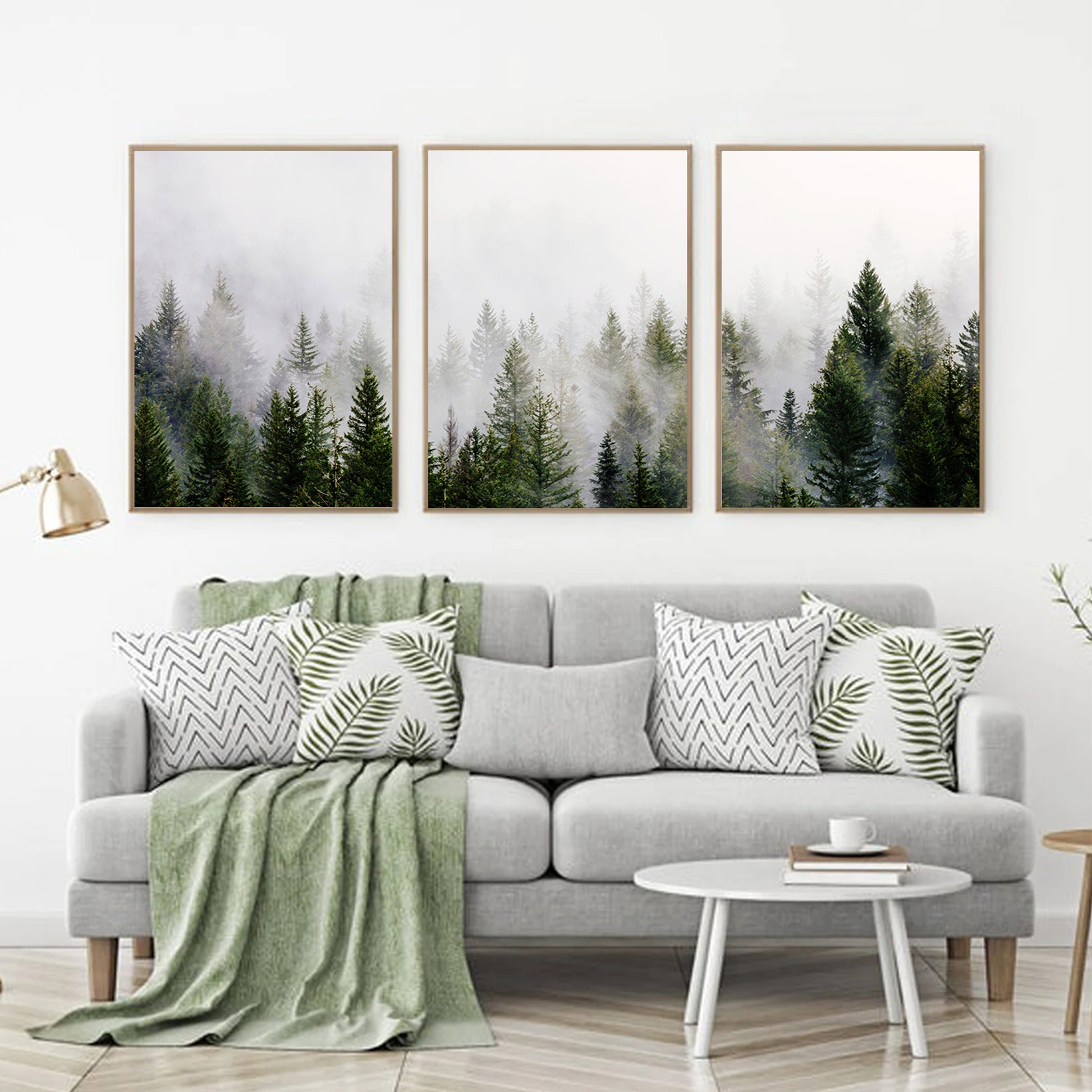 Foggy forest wall art printed on matte paper above the sofa.