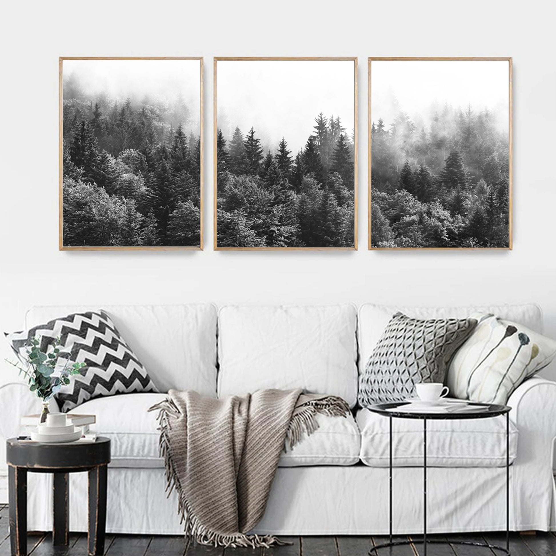 Three nature photos in living room.