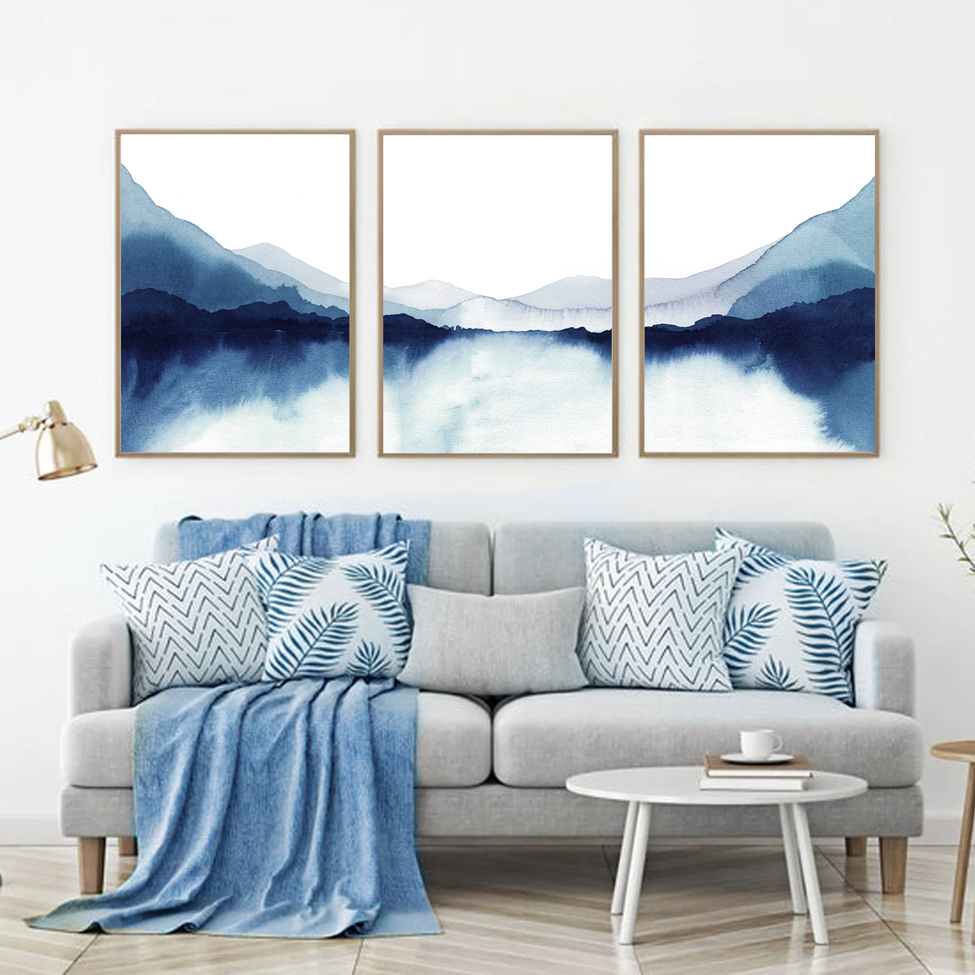 Watercolor lake triptych in the interior of blue shades.